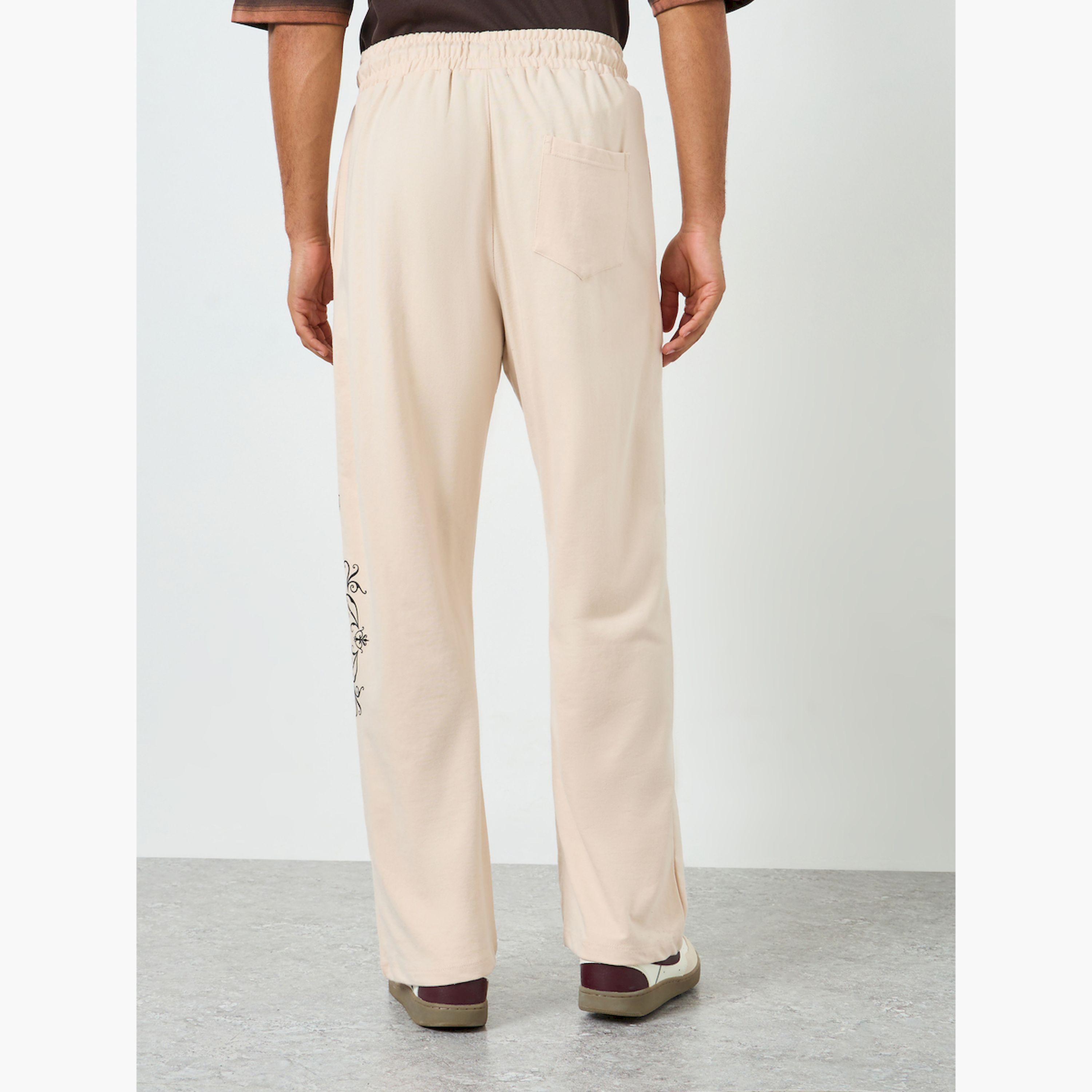 بنطال جوغر بطبعة رسومات وقصة واسعة-men-clothing-bottoms-joggers-image-5