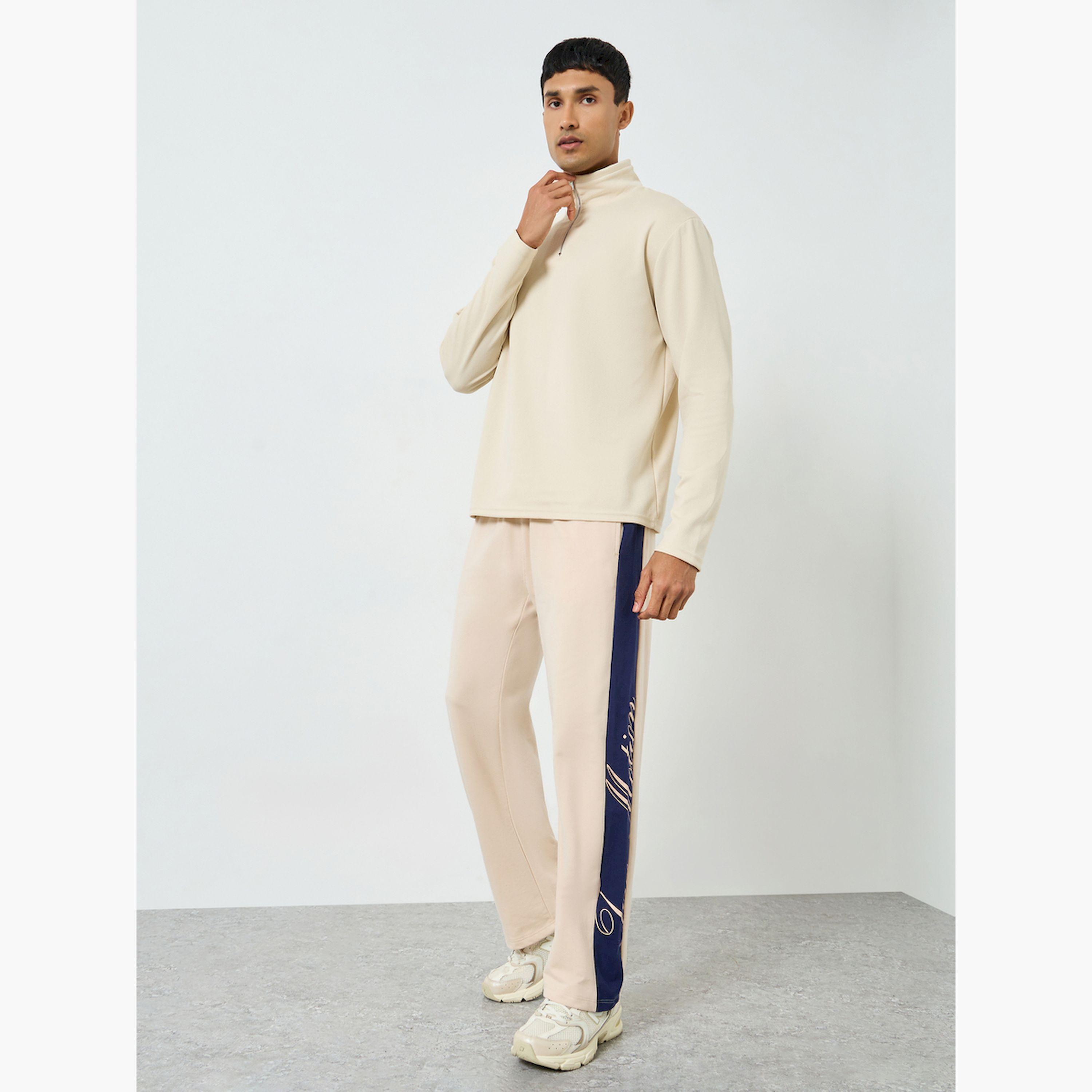 بنطال جوغر بقصة واسعة وطبعة وألواح متباينة-men-clothing-bottoms-joggers-image-2