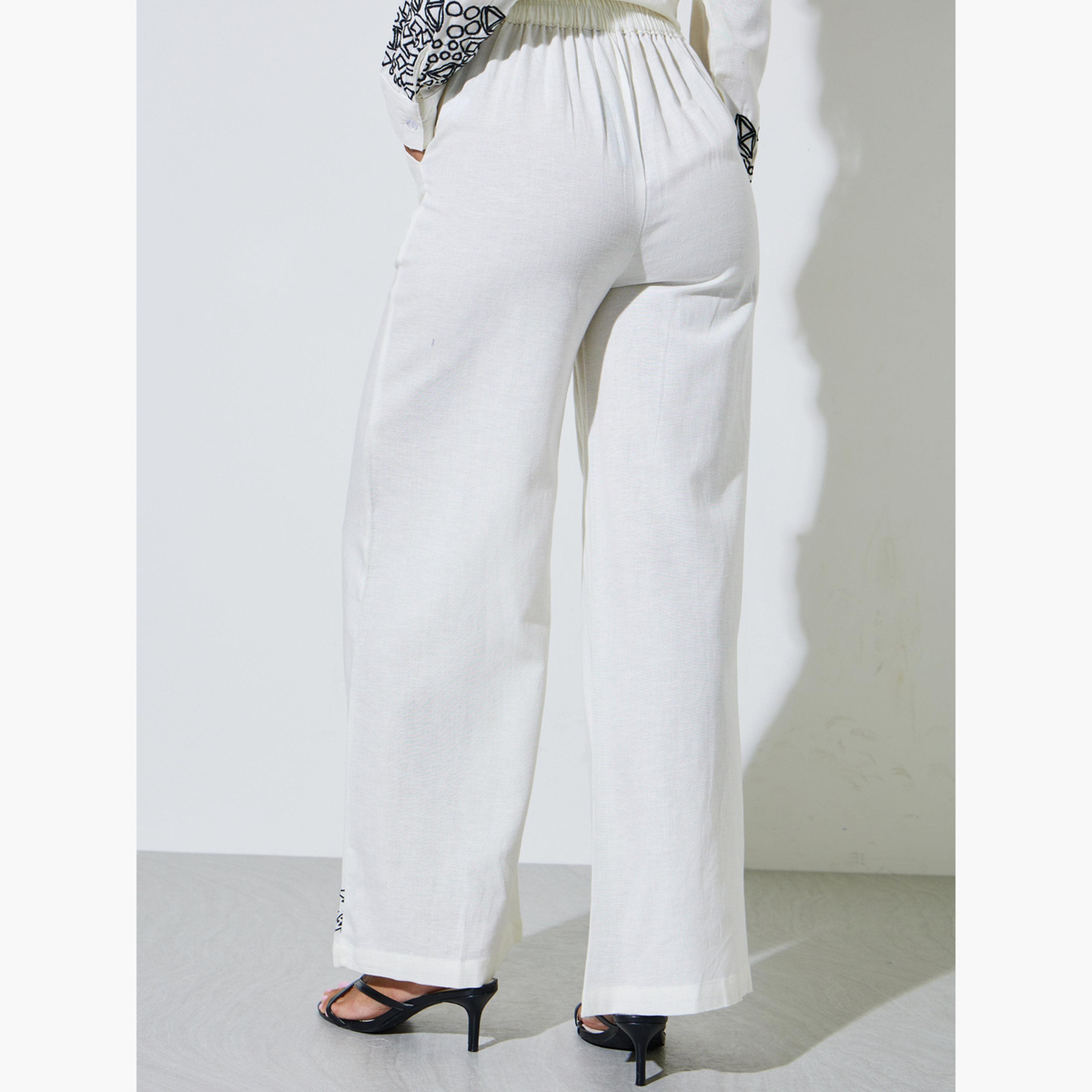 بنطال بأرجل واسعة وحافة مطرزة لون أوف وايت-women-clothing-bottoms-joggers-image-5