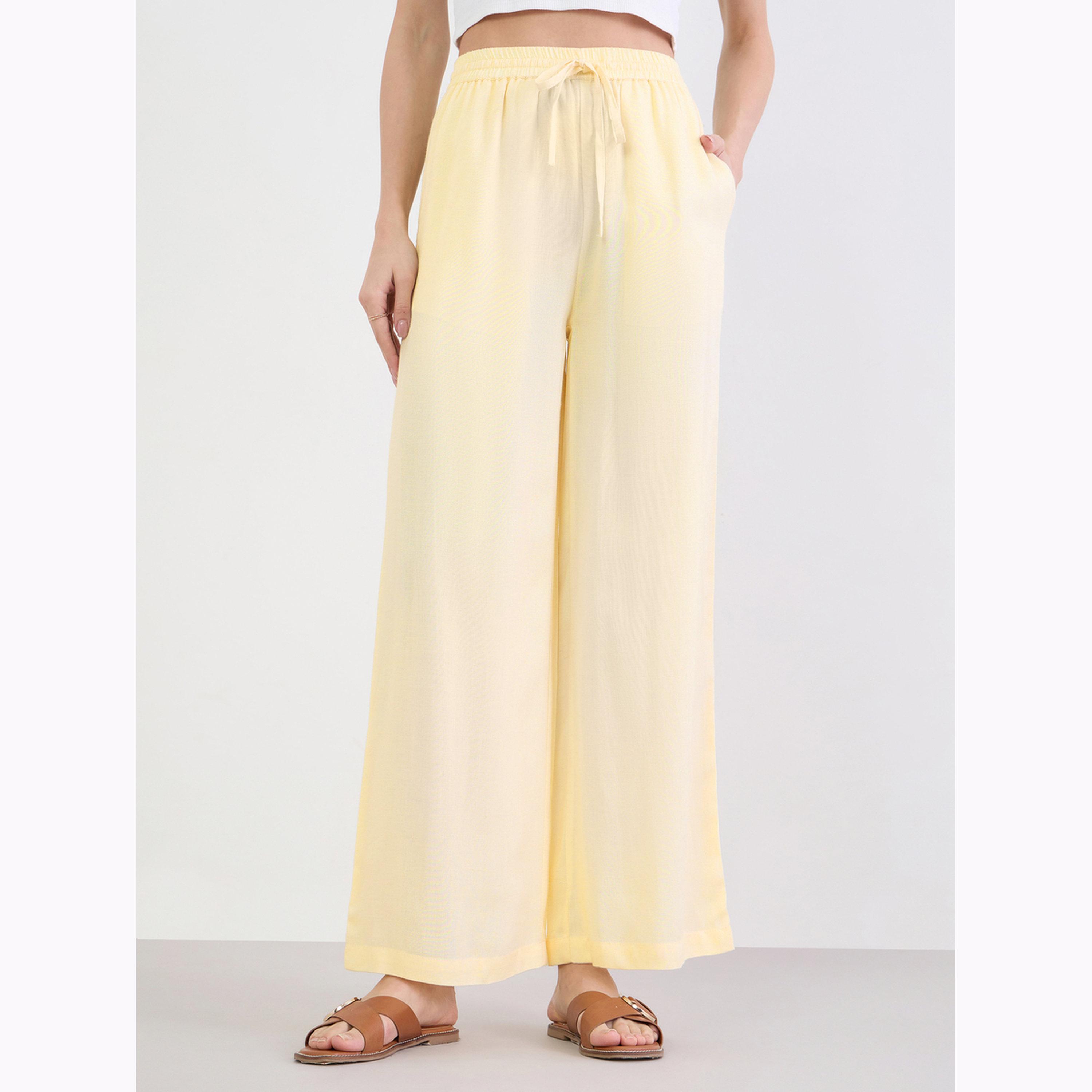 بنطال بأرجل واسعة ورباط سحب لون أصفر-women-clothing-bottoms-joggers-image-1