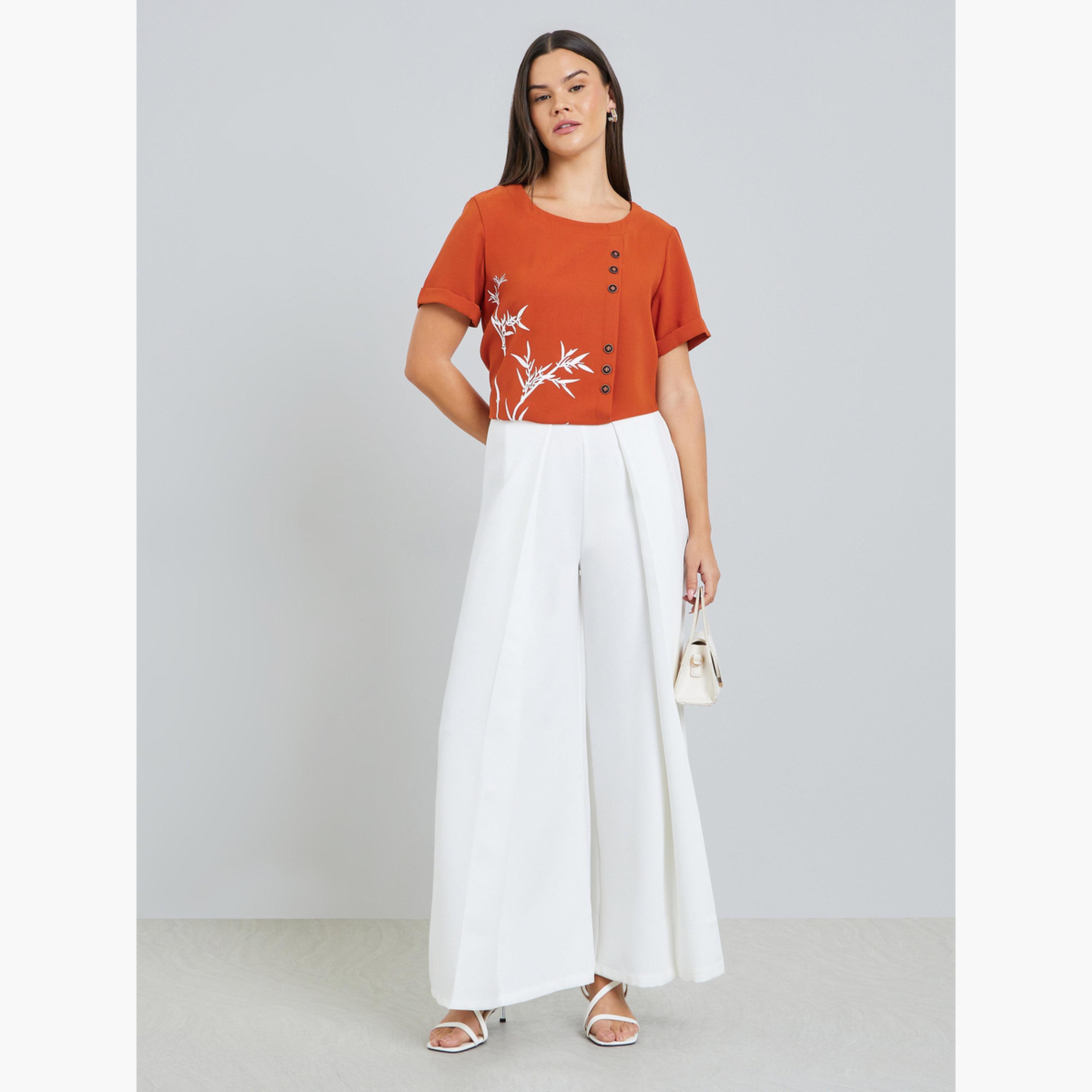 بنطال أبيض واسع الساق بتفاصيل كسرات-women-clothing-bottoms-trousers-image-2