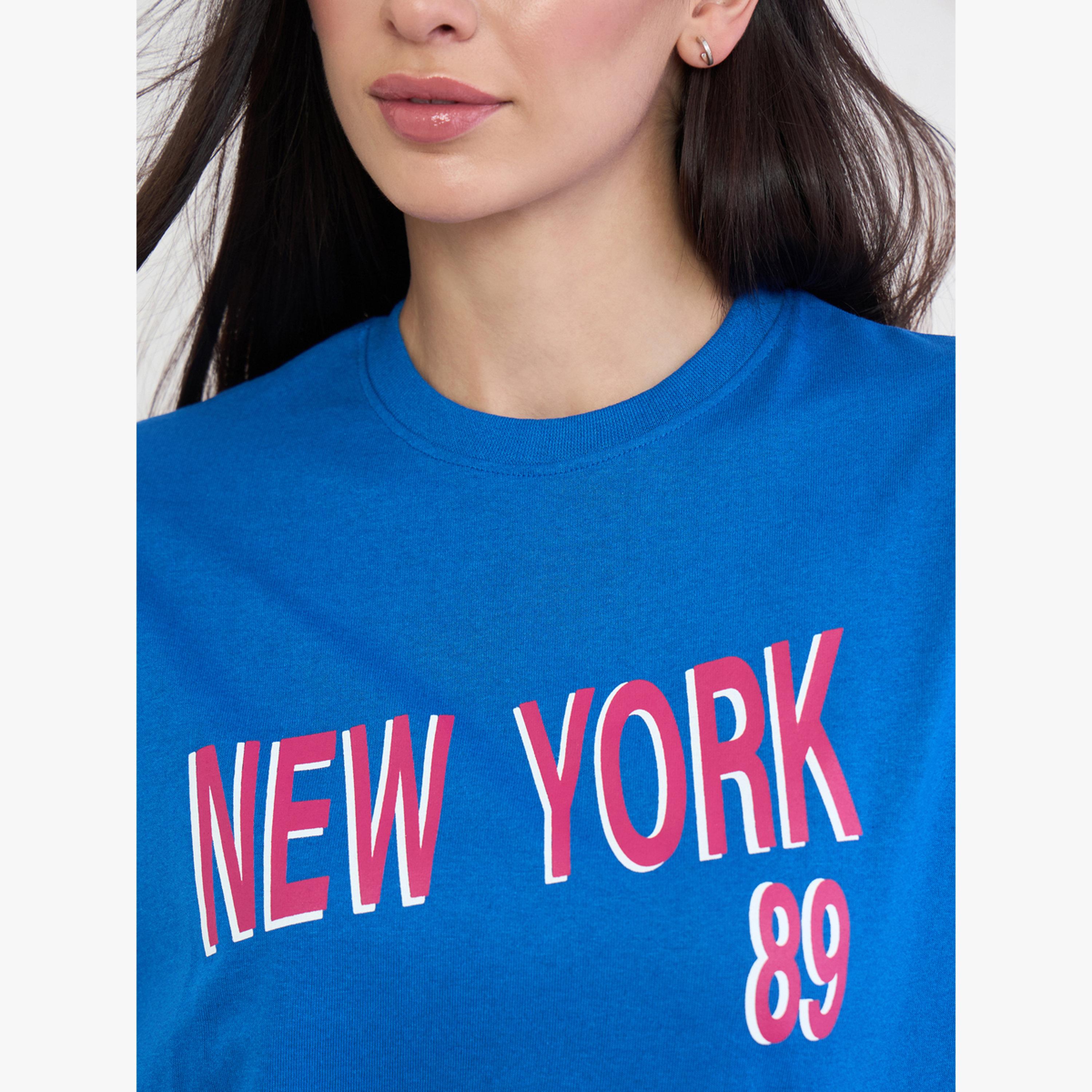 تيشيرت فضفاض بطبعة شعار-women-clothing-tshirts-image-5