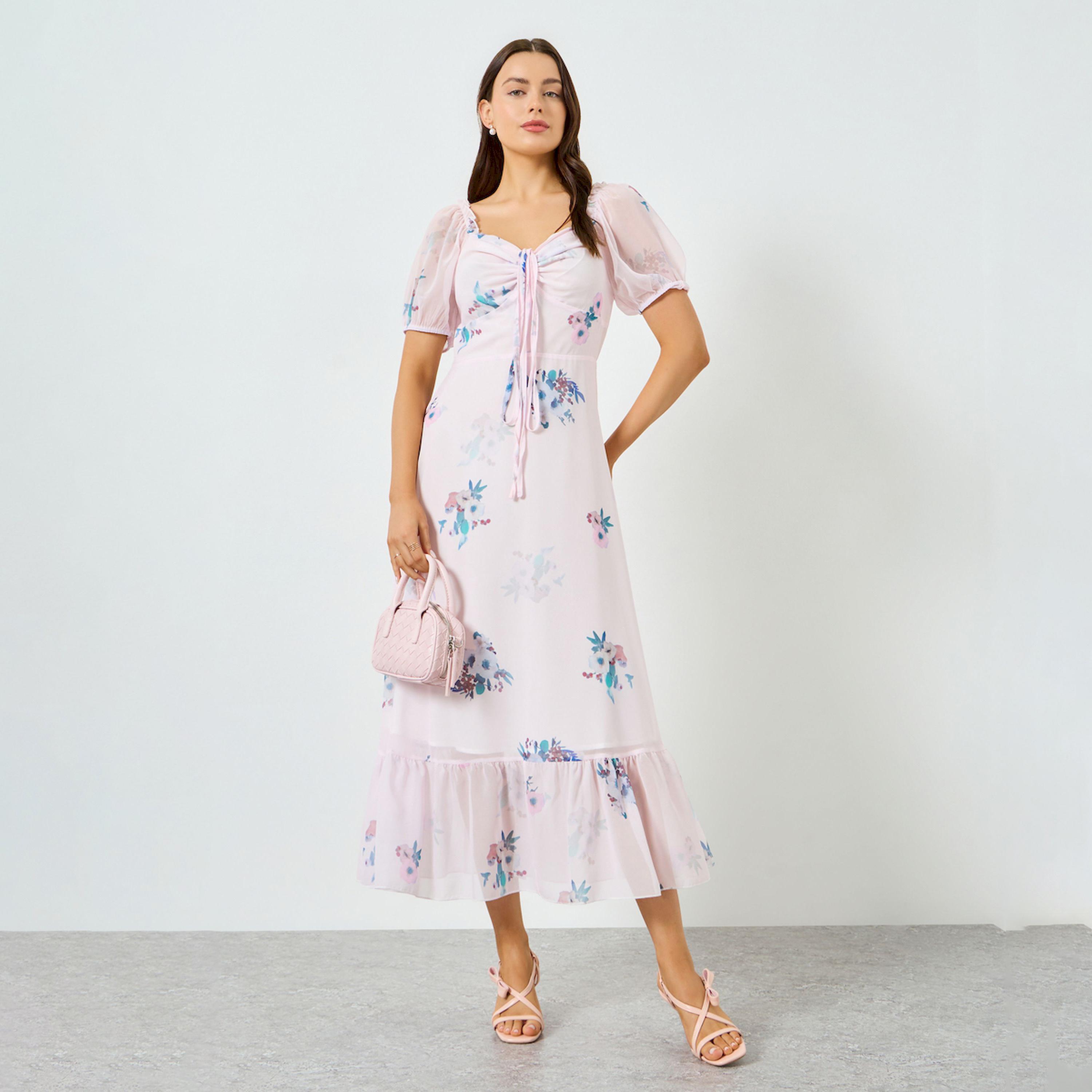 فستان طويل وردي بطبعة زهور وأكمام منفوخة وحاشية مكشكشة-women-clothing-dresses-image-1