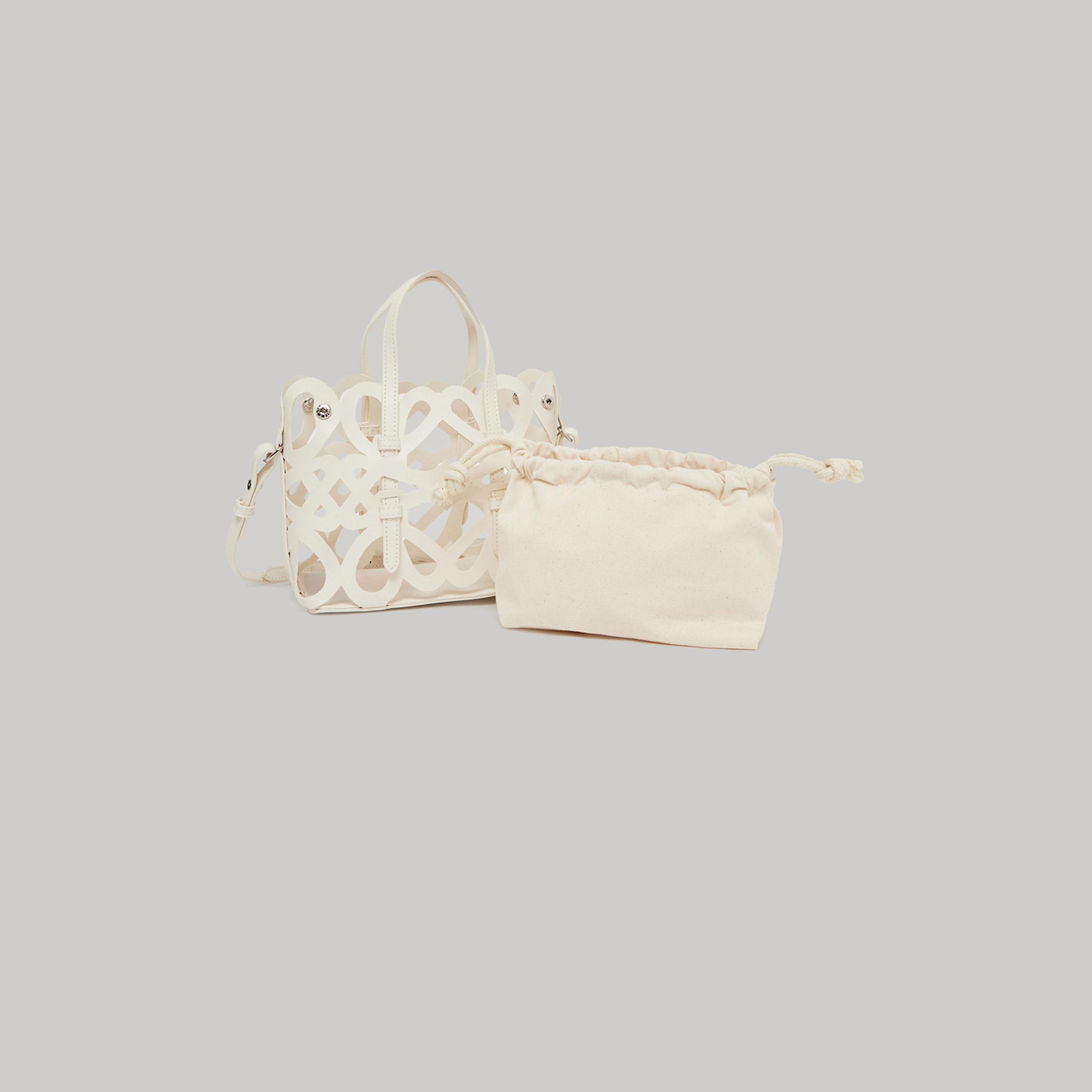 ستايلي - شنطة يد بيضاء بتفاصيل مقصوصة-women-bagsandwallets-handbags-image-2