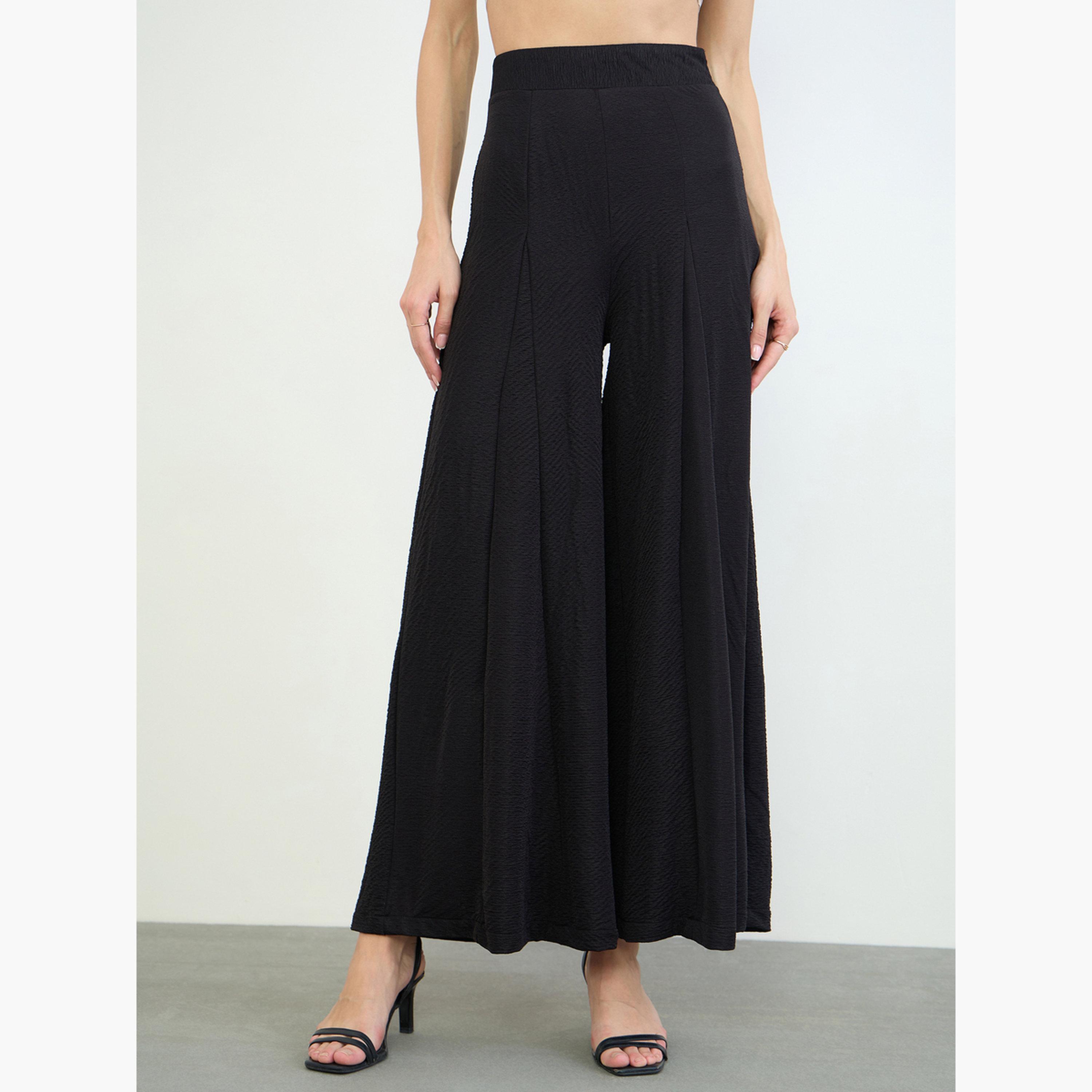 بنطال بأرجل واسعة وتفاصيل بارزة الملمس-women-clothing-trousers-image-1