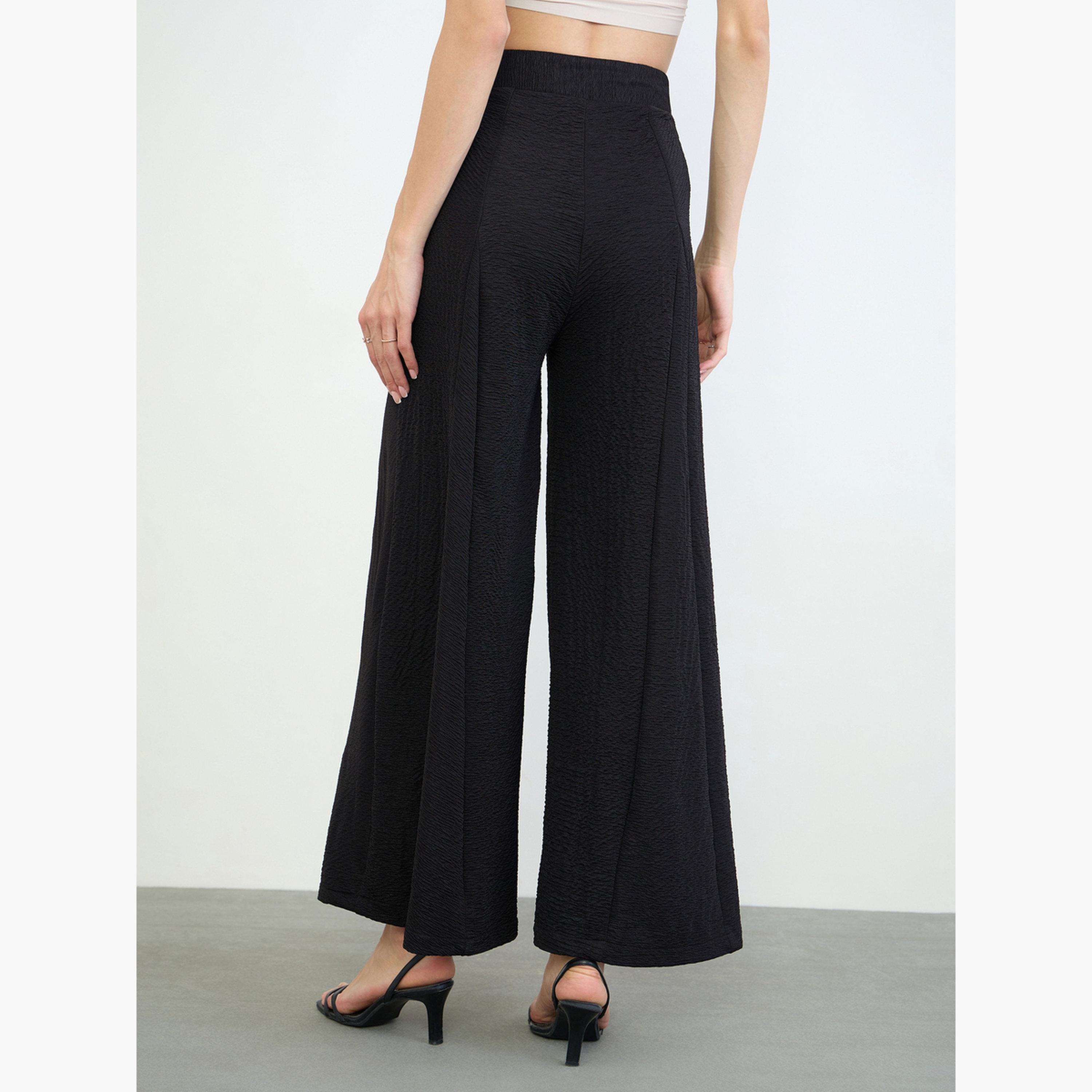 بنطال بأرجل واسعة وتفاصيل بارزة الملمس-women-clothing-trousers-image-4