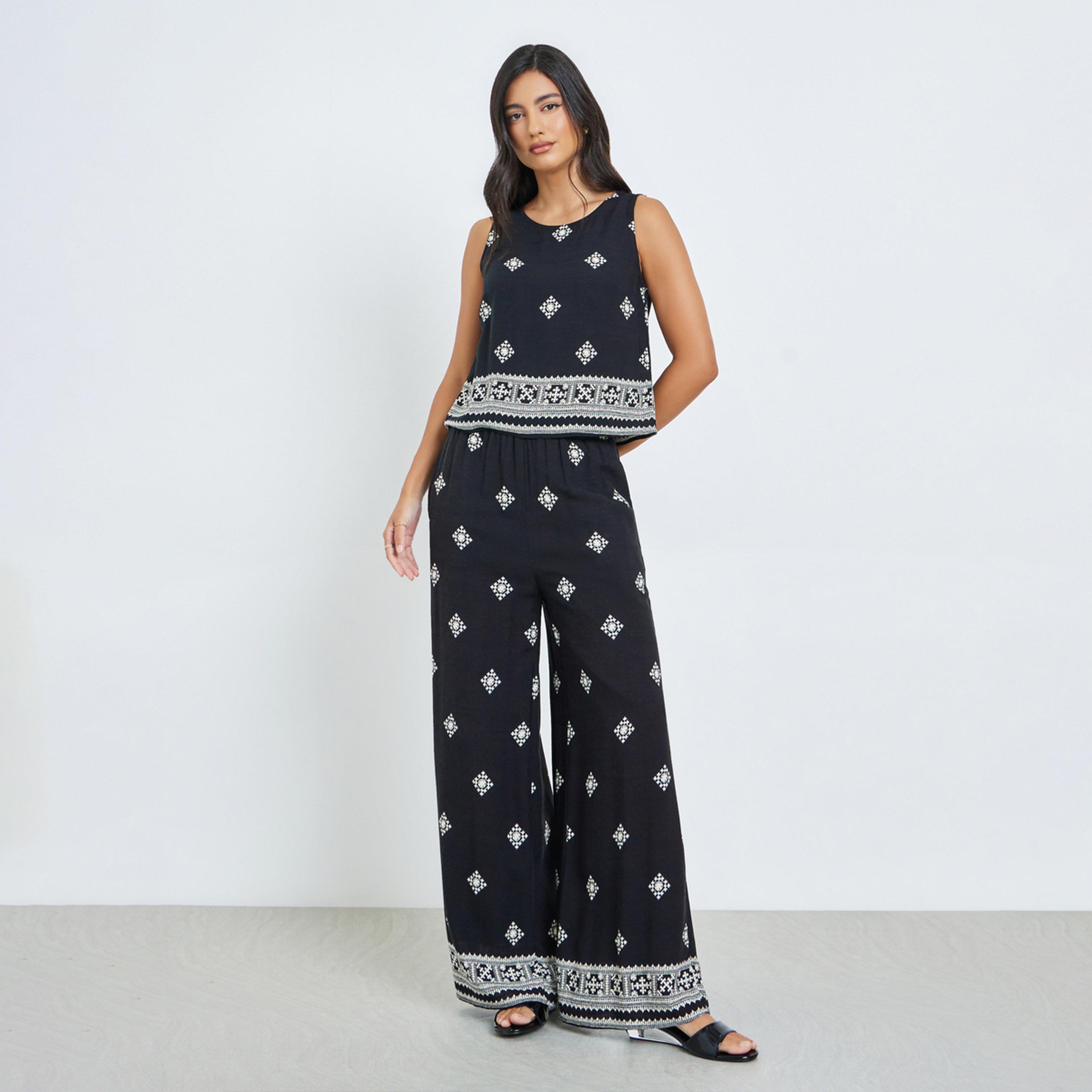 طقم منسق من بنطال وبلوزة بلا أكمام مطبوعة-women-clothing-coordsets-image-1
