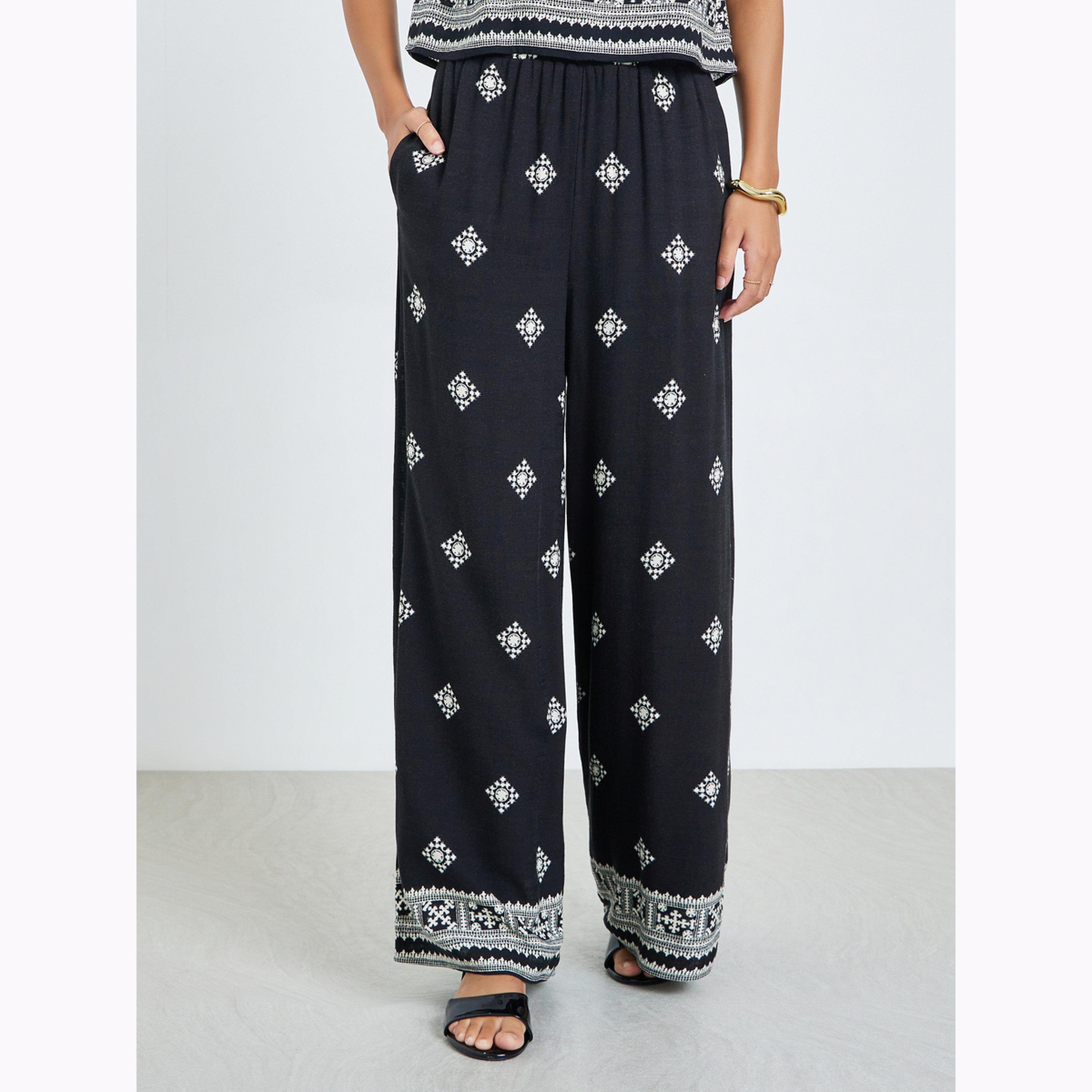 طقم منسق من بنطال وبلوزة بلا أكمام مطبوعة-women-clothing-coordsets-image-5
