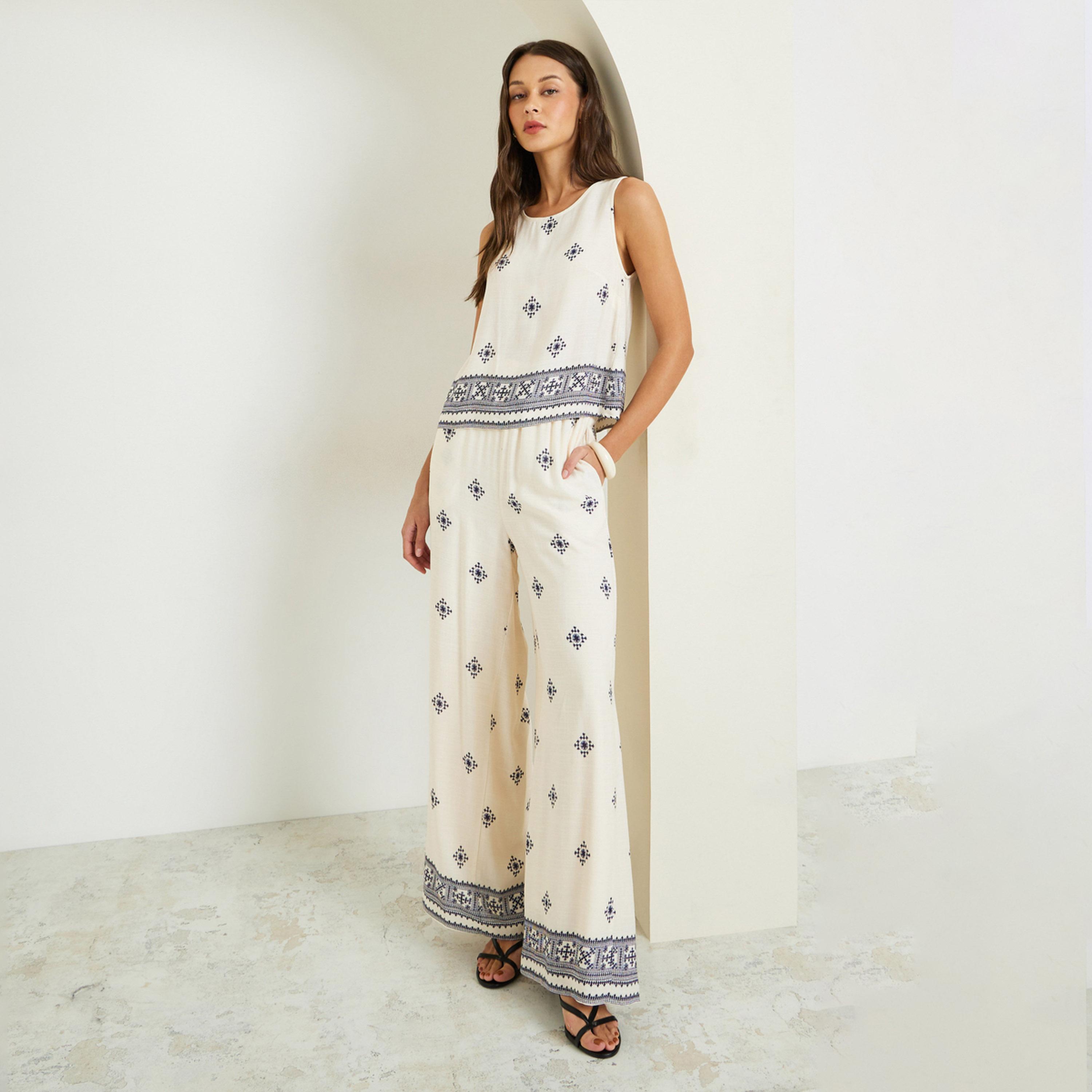 طقم منسق من بنطال وبلوزة دون أكمام مطبوعة-women-clothing-coordsets-image-1