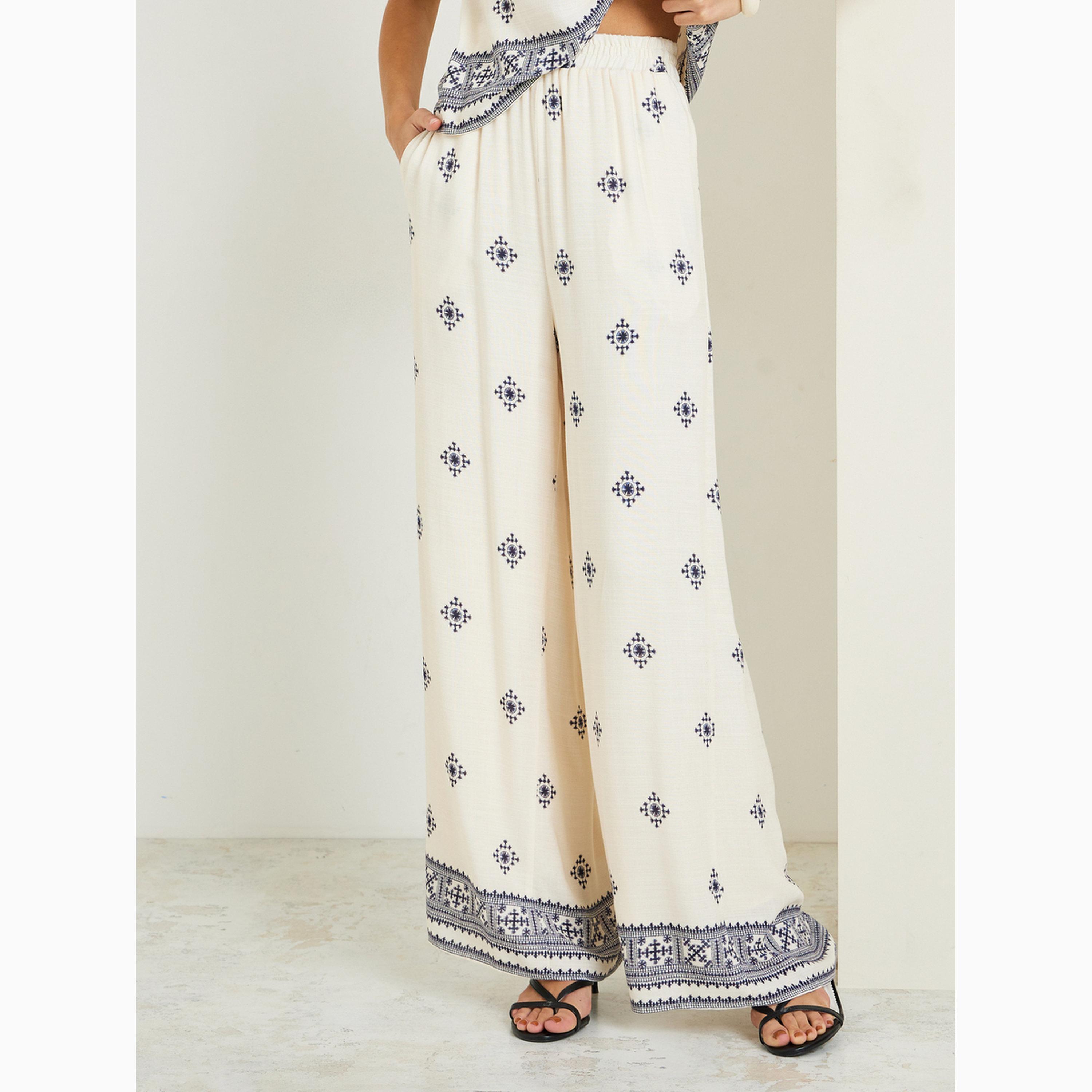 طقم منسق من بنطال وبلوزة دون أكمام مطبوعة-women-clothing-coordsets-image-4