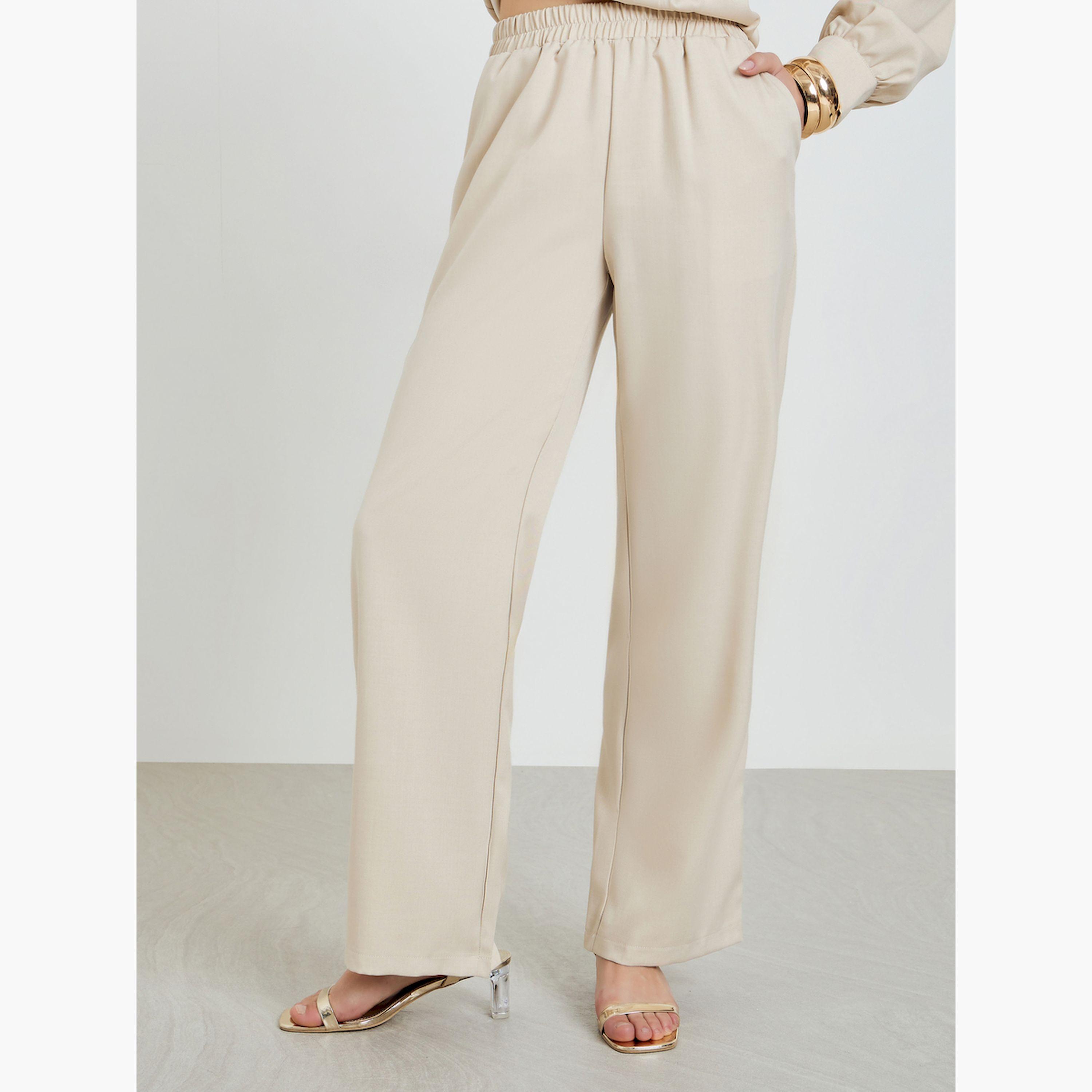 طقم منسق من بنطال بأرجل واسعة وبلوزة بأكمام طويلة وكسرات-women-clothing-coordsets-image-5