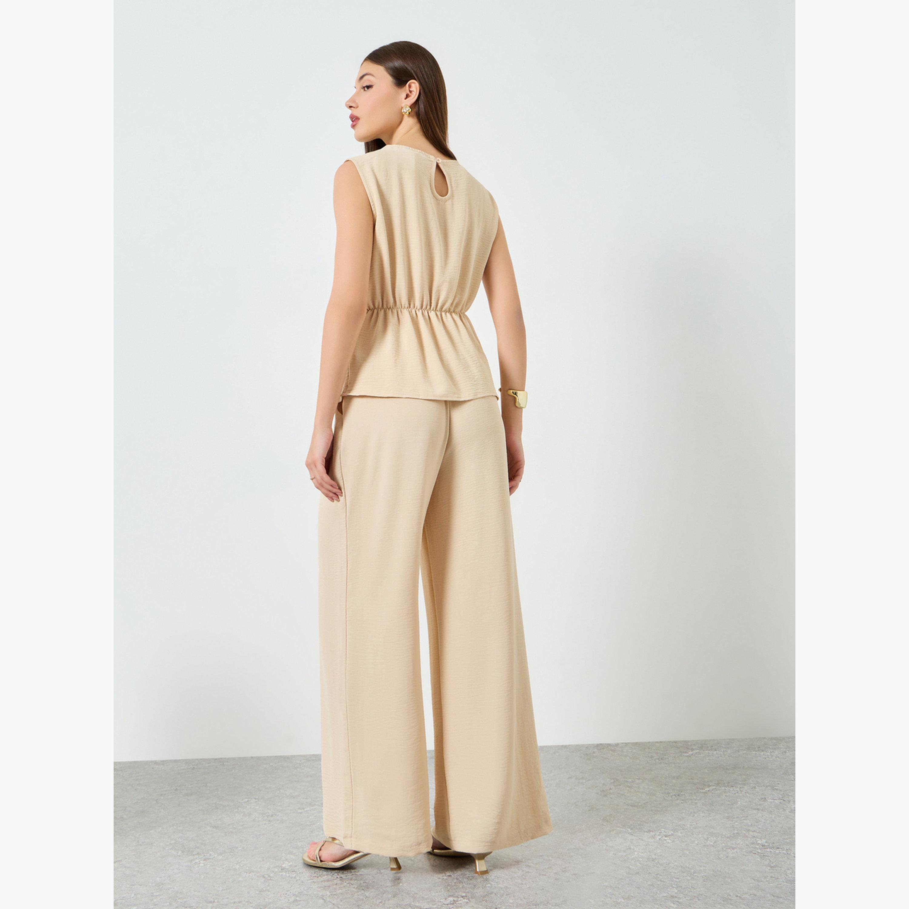 ستايلي - طقم بلوزة بدون أكمام بخصر مكشكش وبنطال واسع الساقين لون بيج-women-clothing-coordsets-image-5