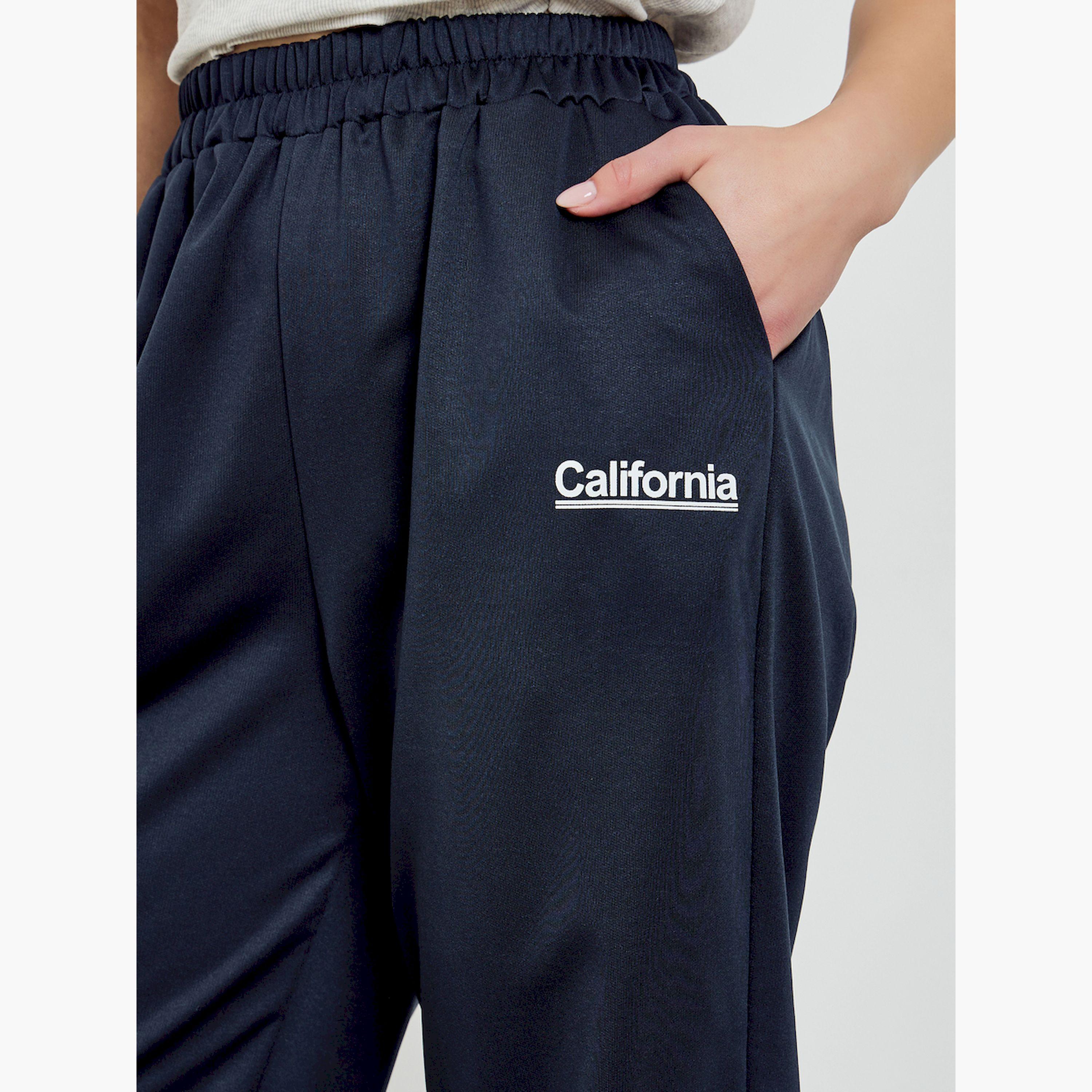 بنطال جوغر مطبوع بشعار وأرجل واسعة-women-clothing-bottoms-joggers-image-3
