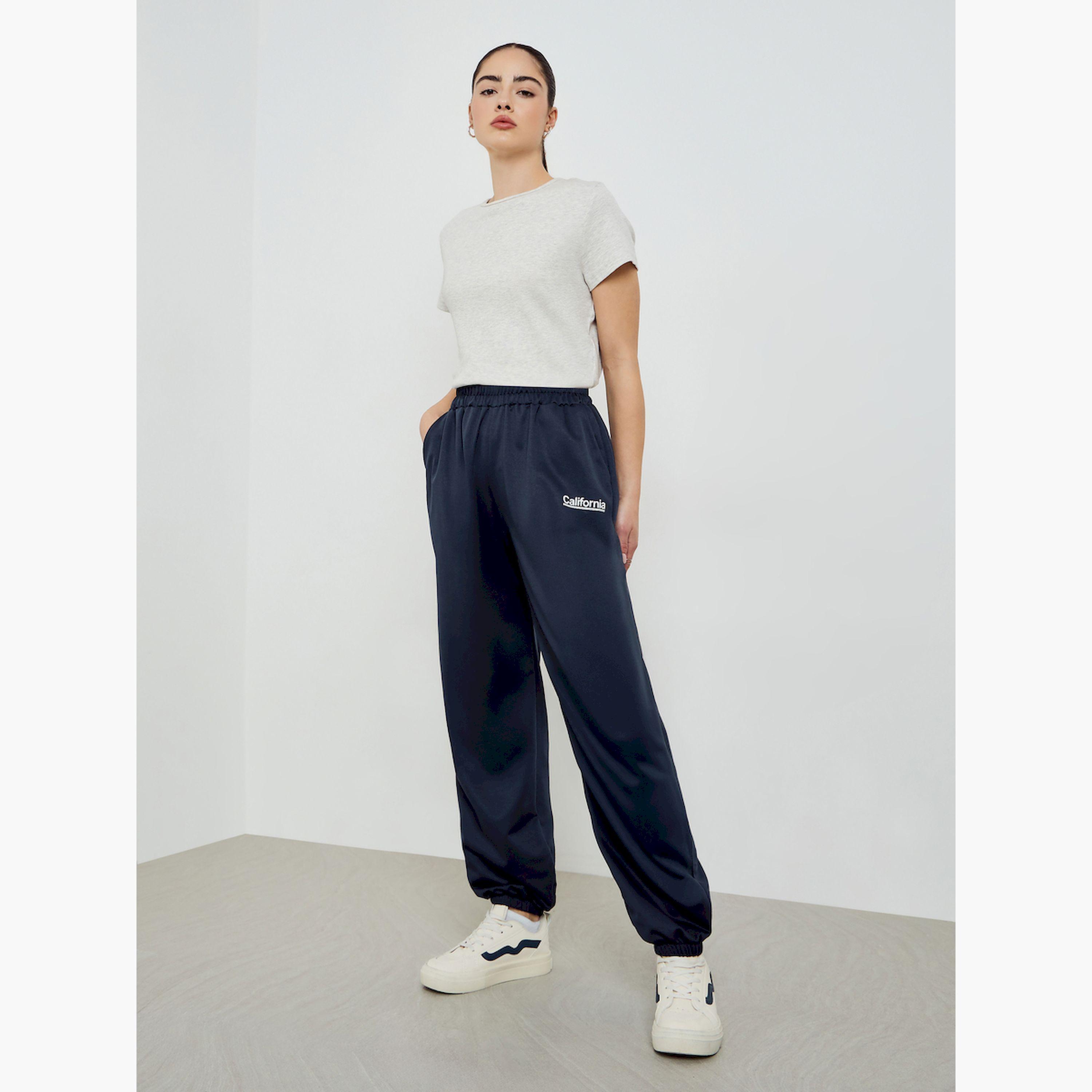 بنطال جوغر مطبوع بشعار وأرجل واسعة-women-clothing-bottoms-joggers-image-5
