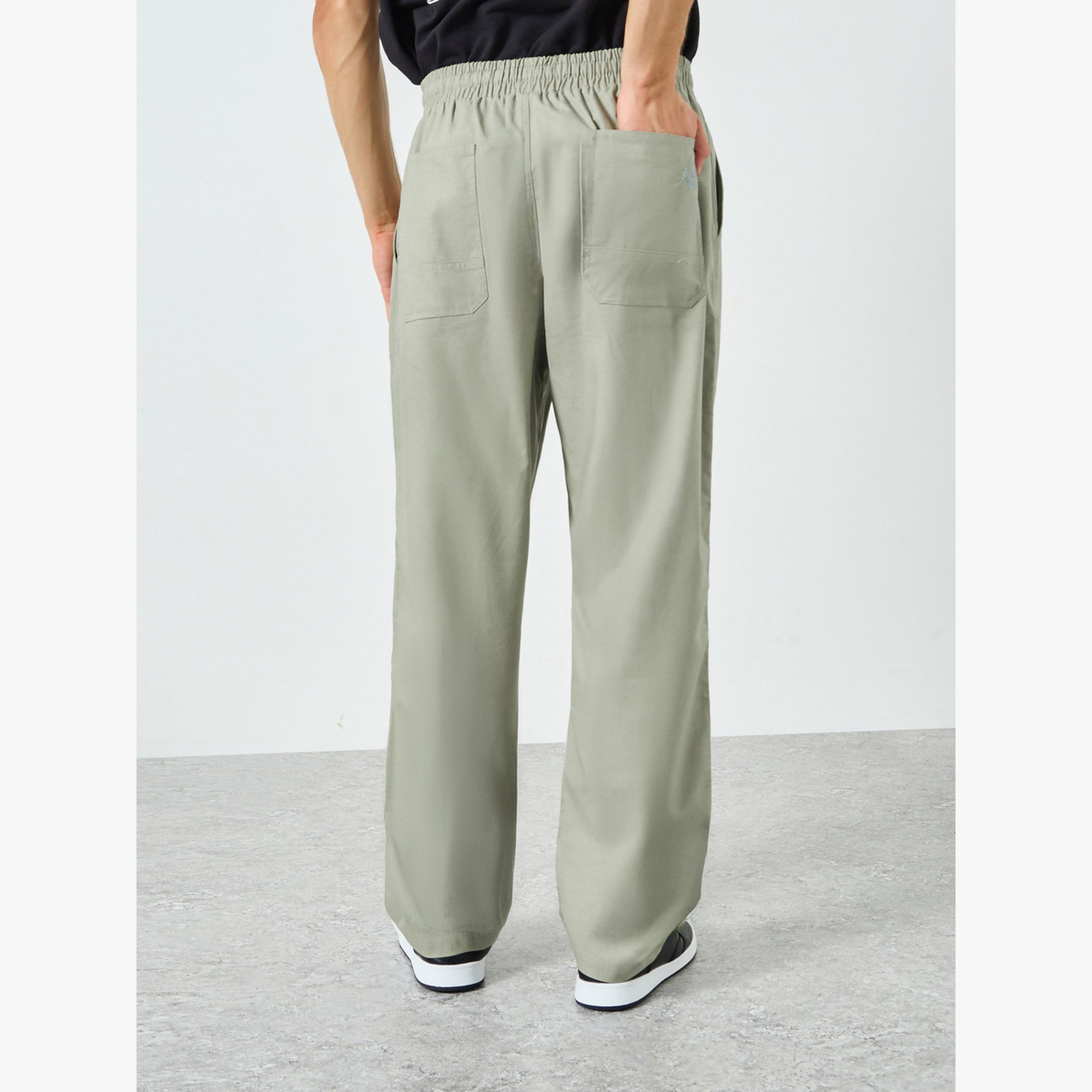 بنطال قصة مريحة من مزيج الكتان للرجال لون رمادي-men-clothing-bottoms-joggers-image-6