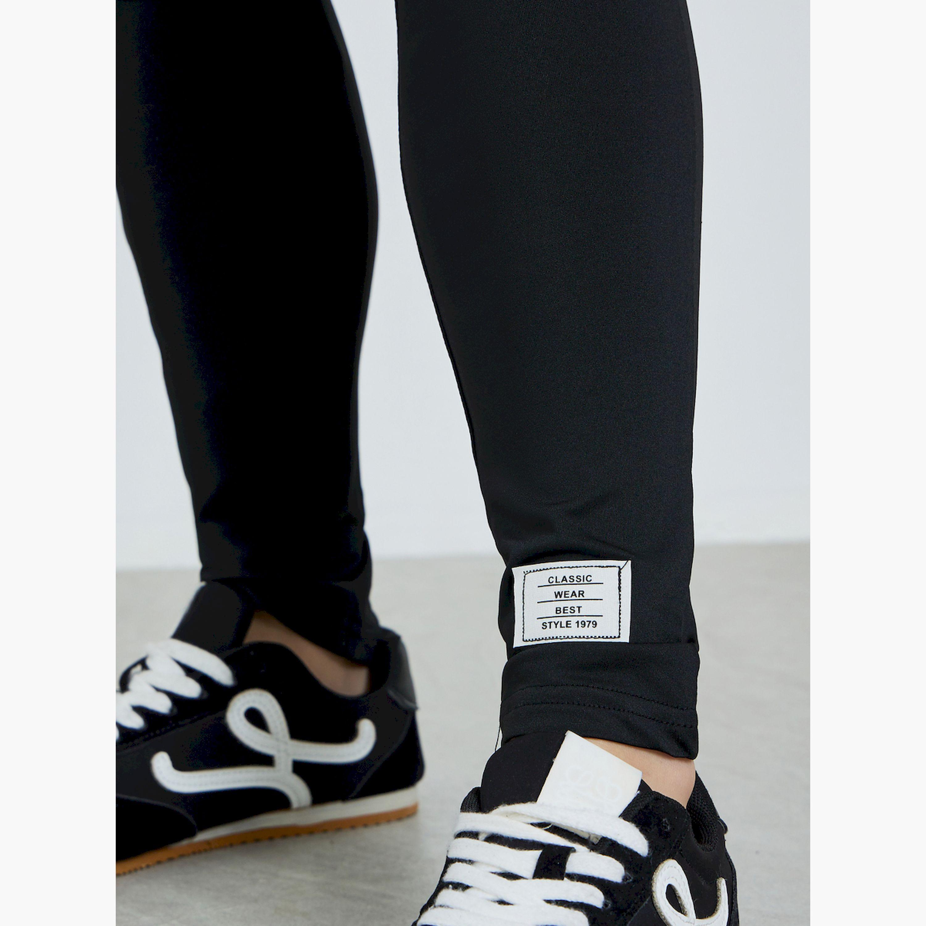 طقم منسق تيشيرت بأكتاف منسدلة وليقنز لون أسود-women-clothing-coordsets-image-5