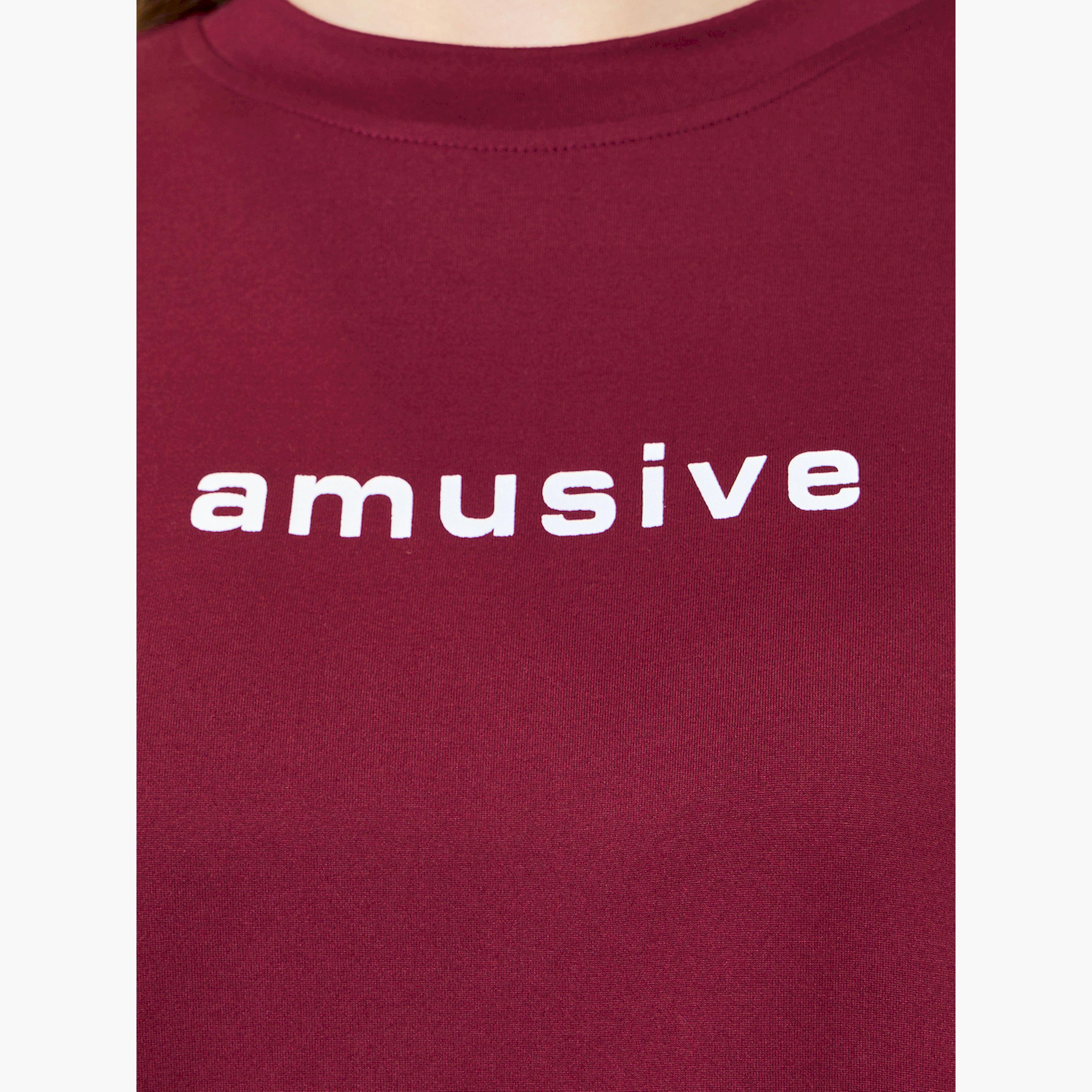 تيشيرت بطبعة شعار وقصة واسعة-women-clothing-tshirts-image-4