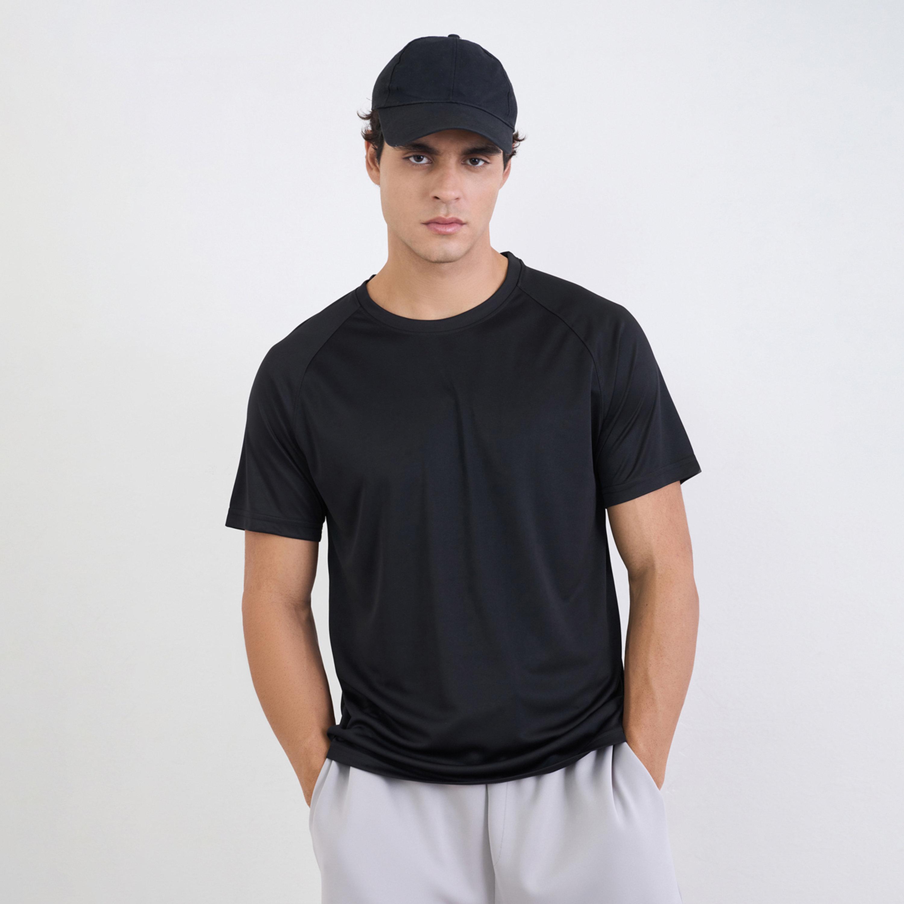 تيشيرت رياضي بأكمام راجلان وطبعة خلفية عاكسة-men-clothing-sportswearandactivewear-tshirtsandpolos-image-1