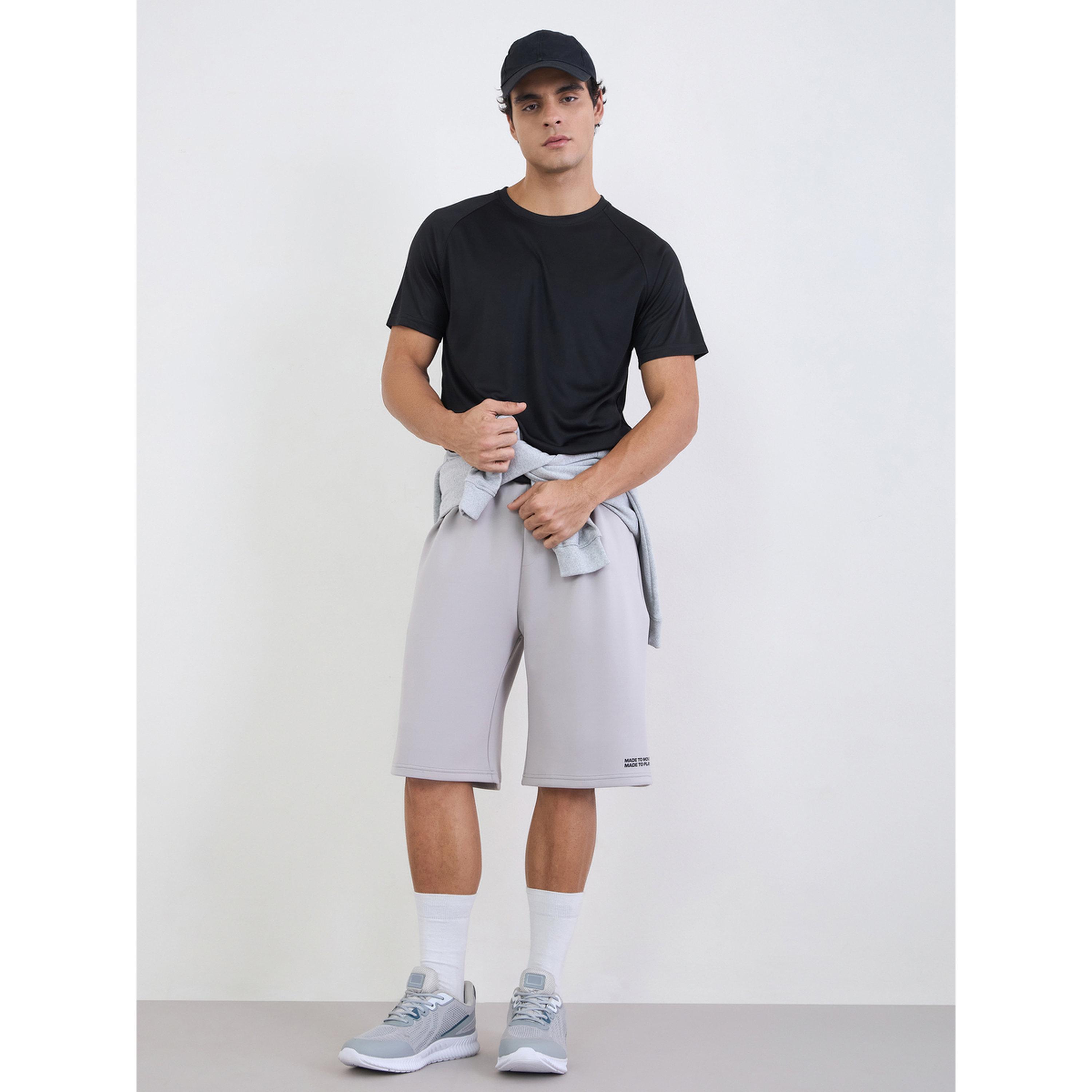تيشيرت رياضي بأكمام راجلان وطبعة خلفية عاكسة-men-clothing-sportswearandactivewear-tshirtsandpolos-image-2