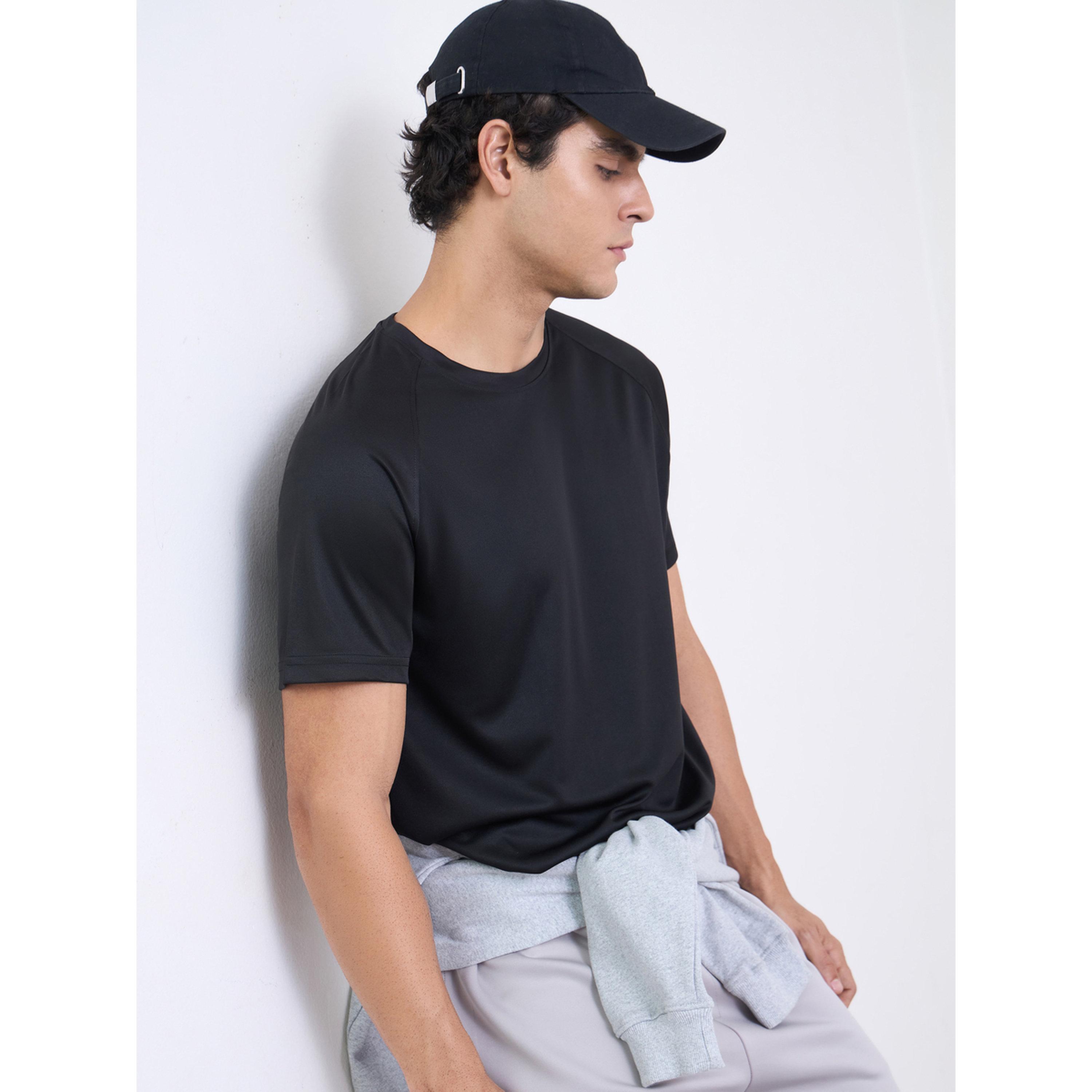 تيشيرت رياضي بأكمام راجلان وطبعة خلفية عاكسة-men-clothing-sportswearandactivewear-tshirtsandpolos-image-3