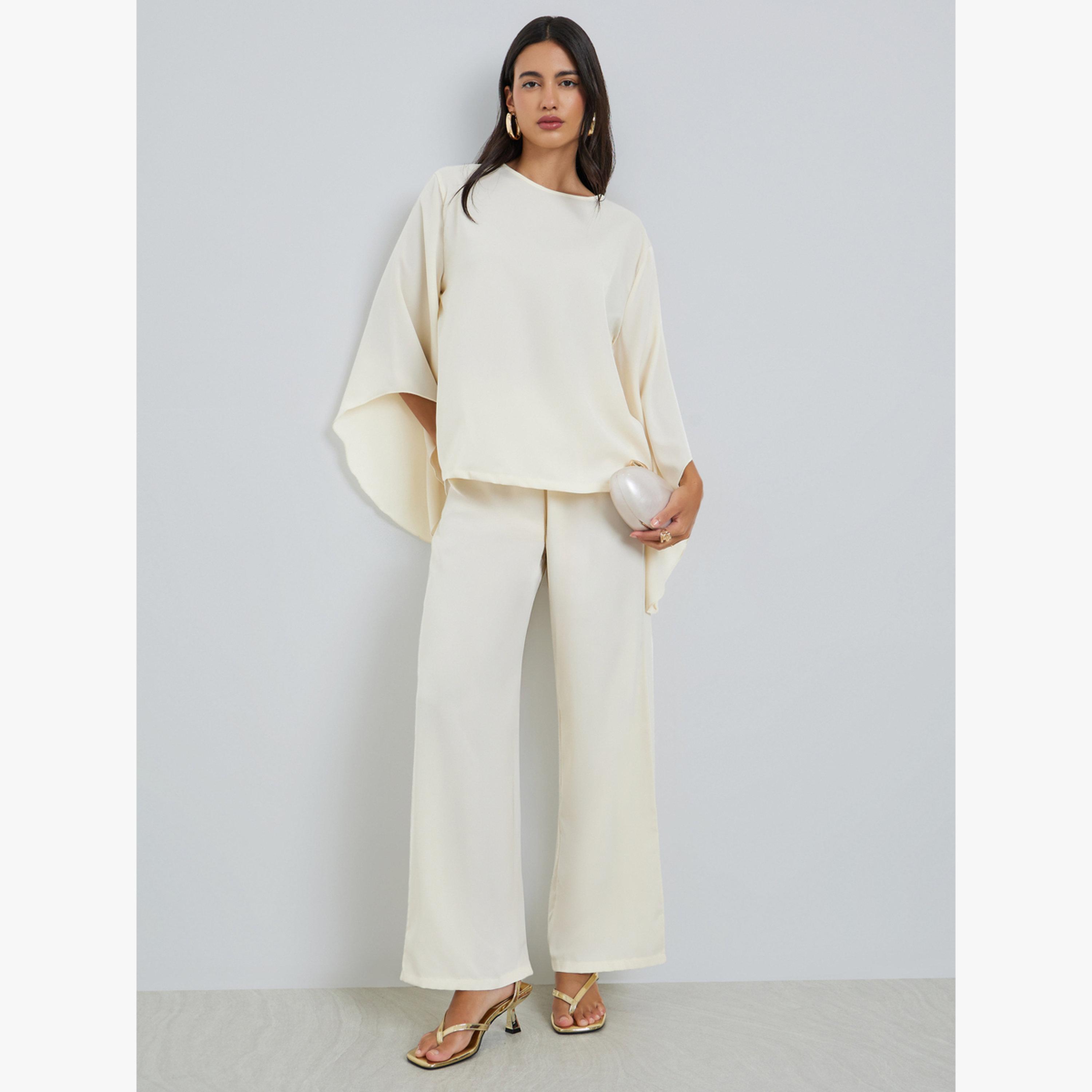 طقم منسق من بنطال وبلوزة بأكمام واسعة-women-clothing-coordsets-image-1