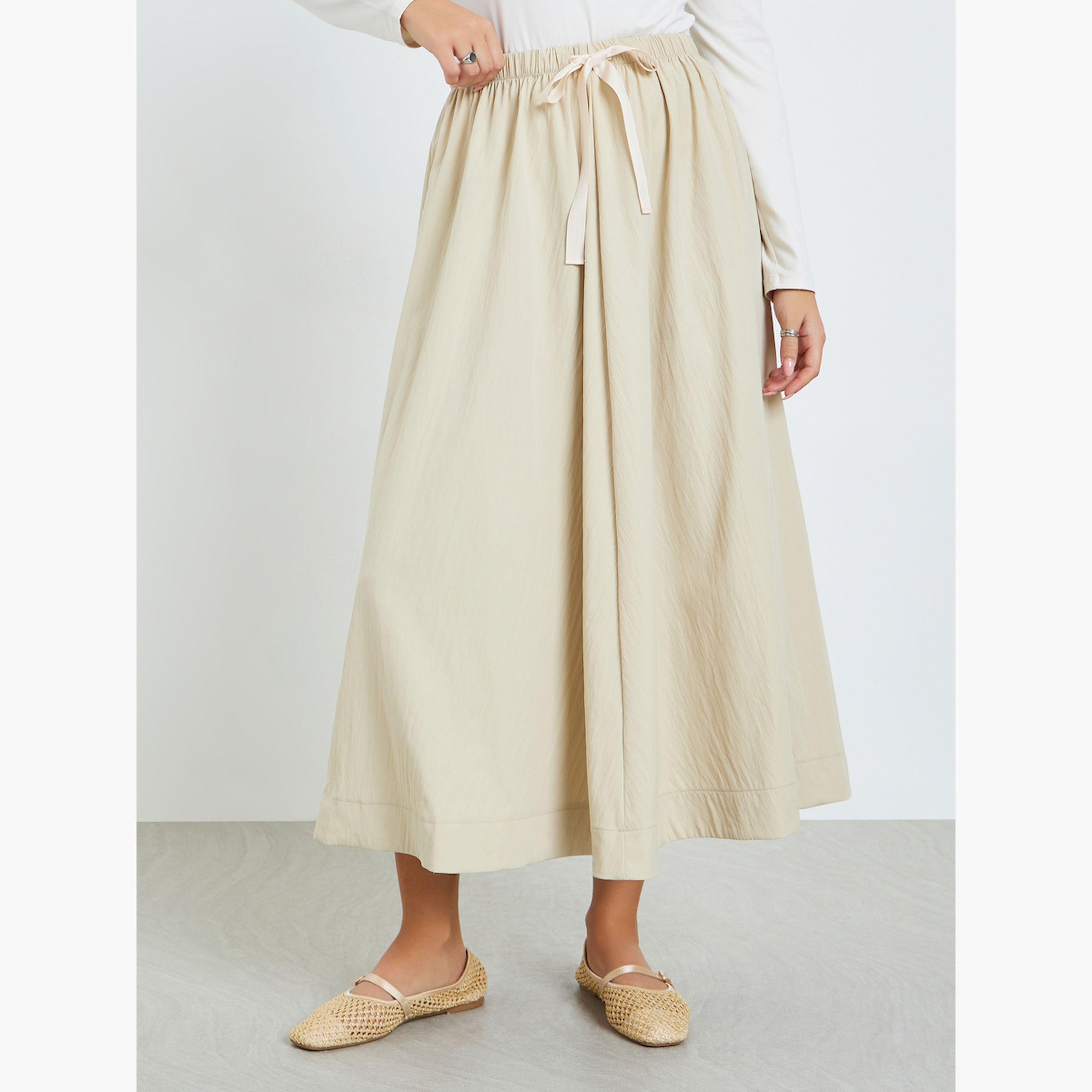 تنورة بكسرات ورباط خصر-women-clothing-bottoms-skirts-image-1