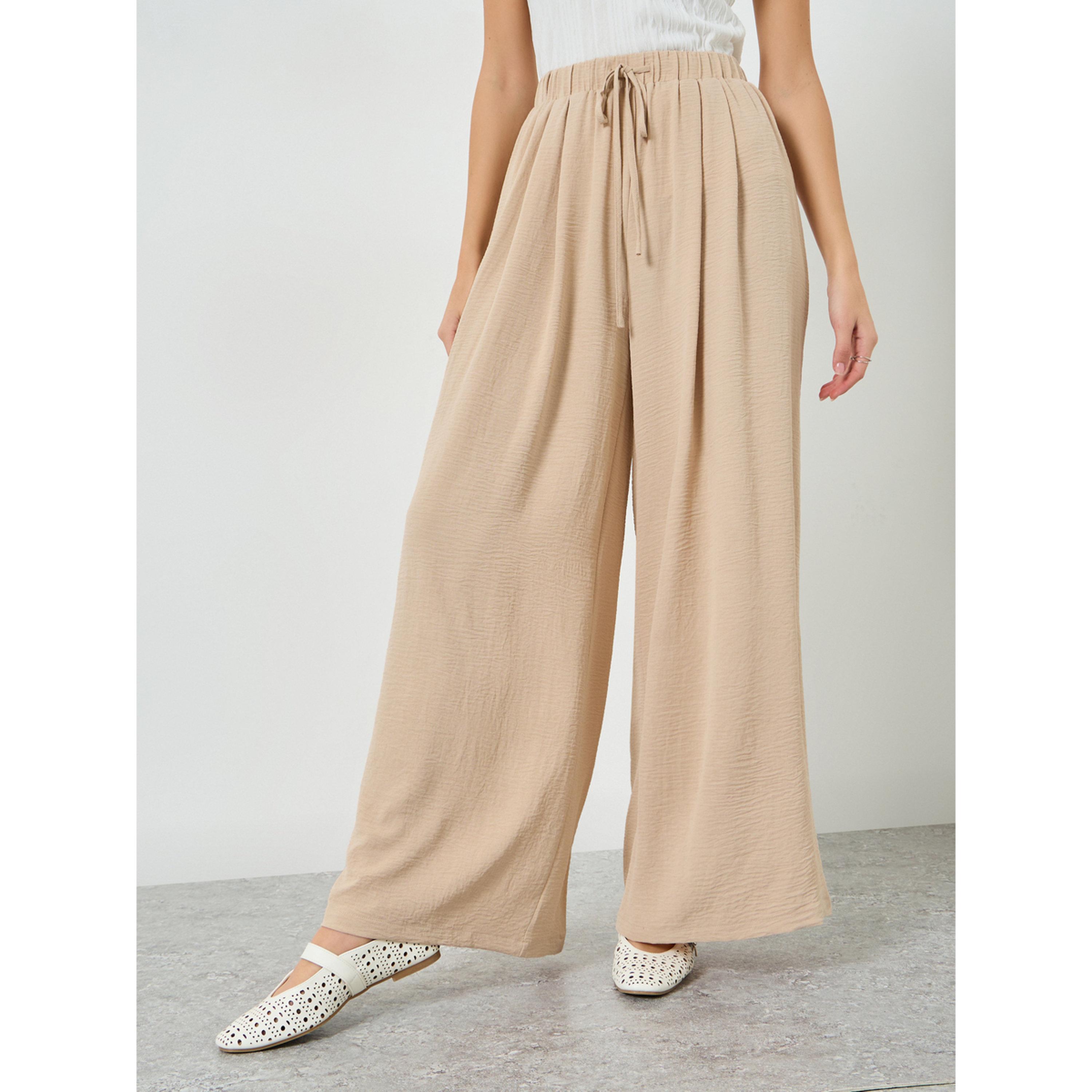 Take Two Beige Wide Leg Pleated Trousers-women-clothing-bottoms-joggers-image-1