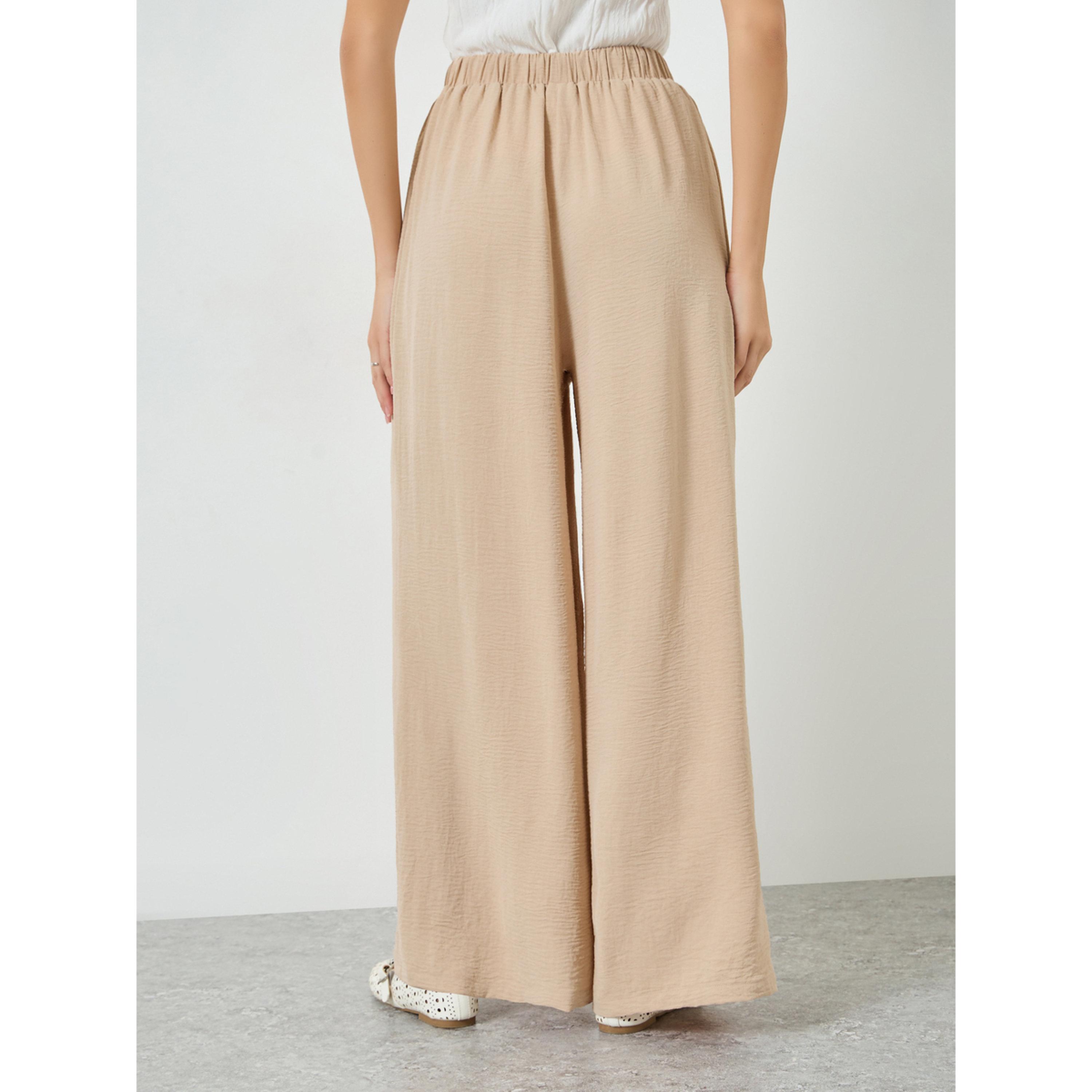 بنطال بأرجل واسعة وبكسرات-women-clothing-bottoms-joggers-image-4