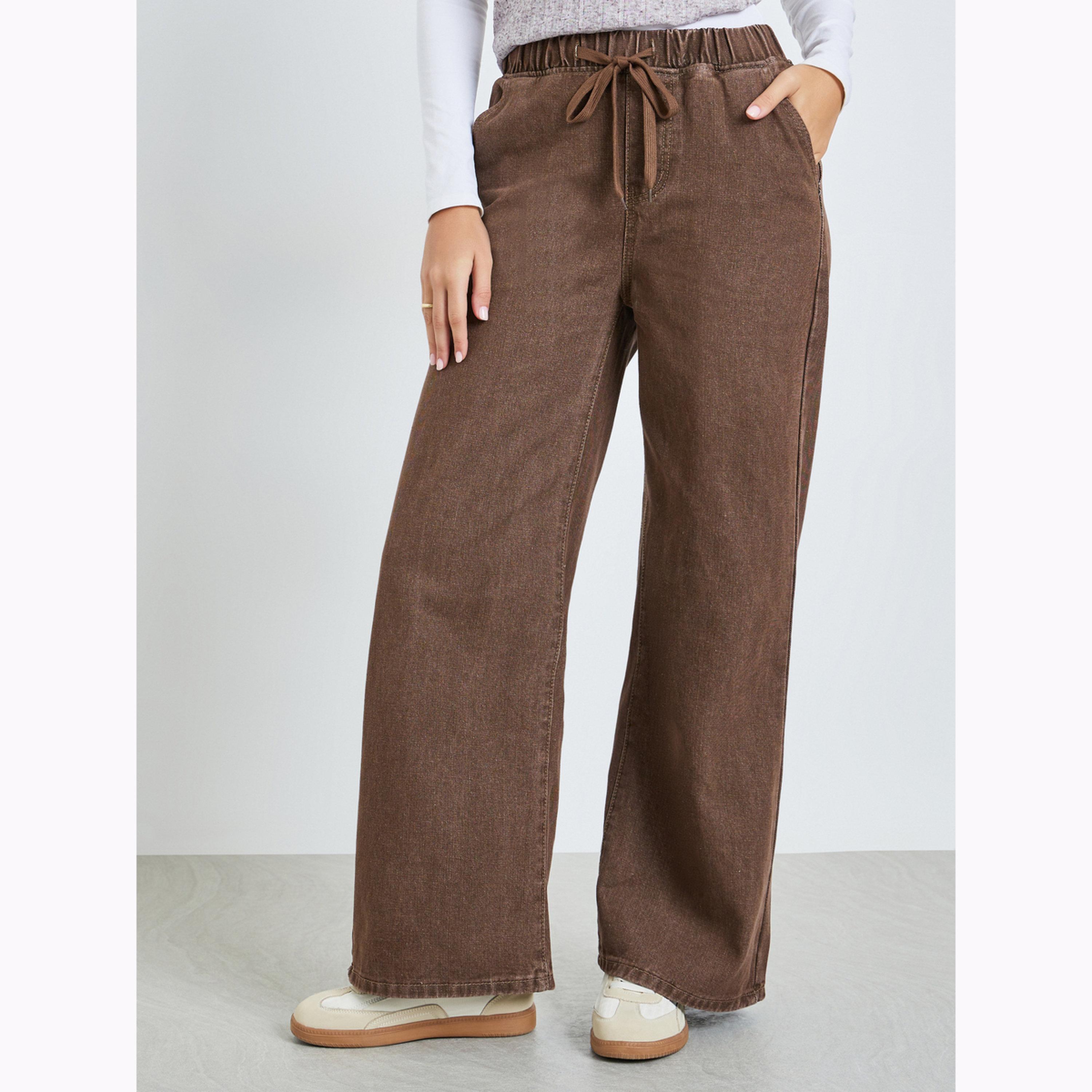 جينز باهت بأرجل واسعة وتصميم جوغر بلون بني-women-clothing-bottoms-joggers-image-1