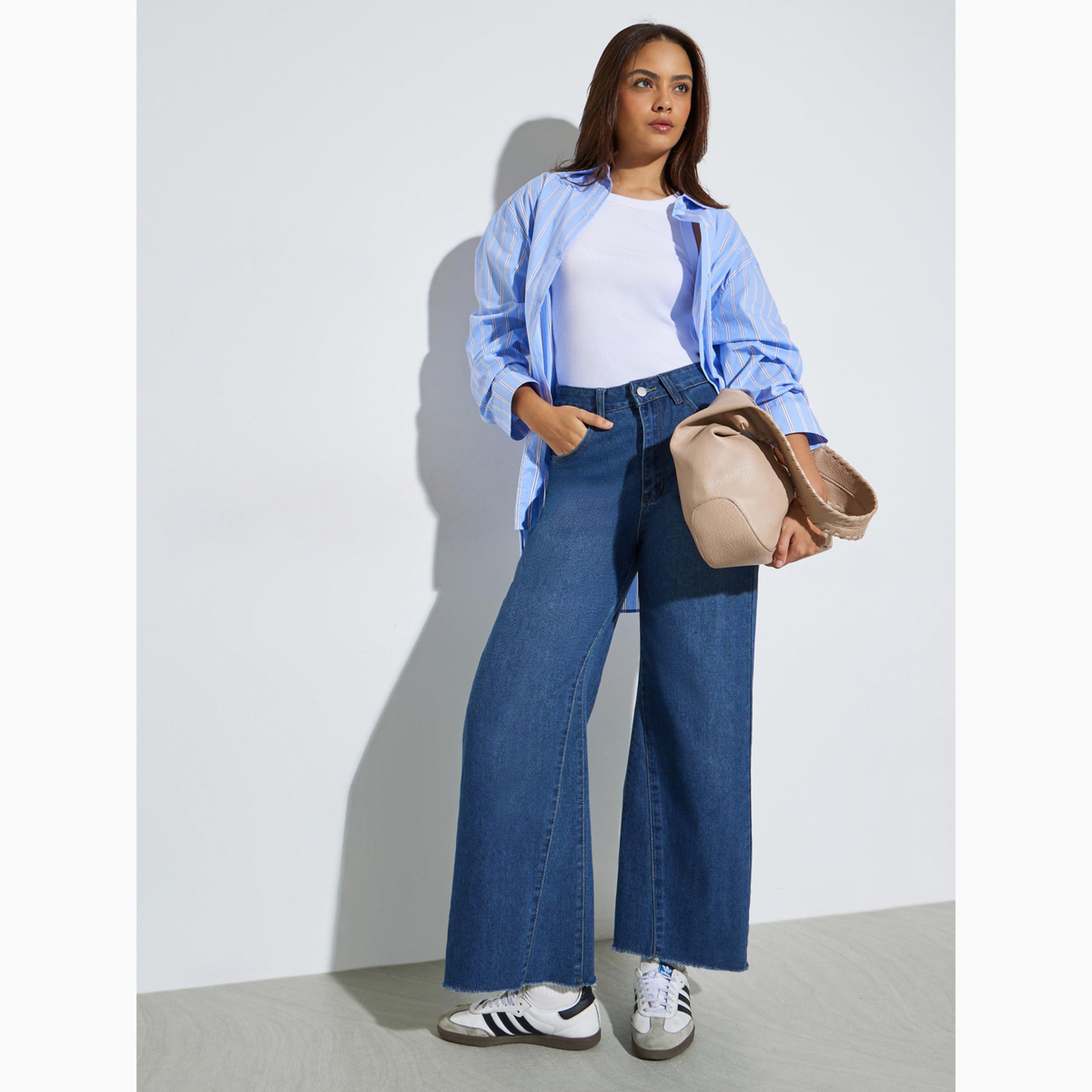 جينز باهت بأرجل واسعة بلون أزرق-women-clothing-bottoms-jeans-image-2