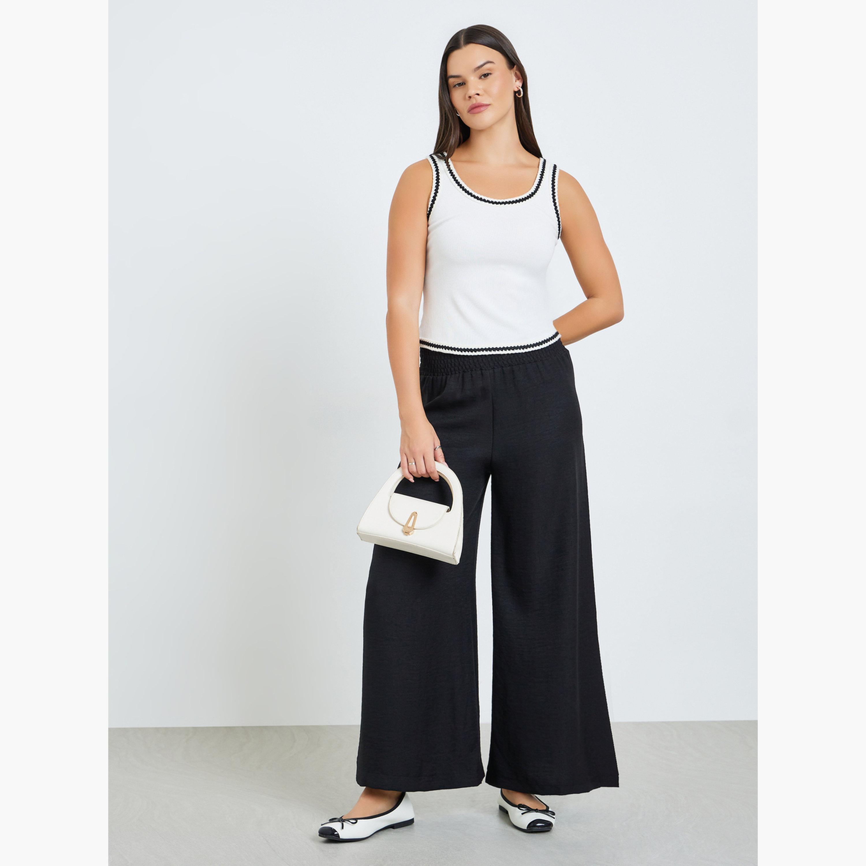 بنطال نسائي بقصة واسعة وخصر مزموم بلون أسود-women-clothing-bottoms-trousers-image-2