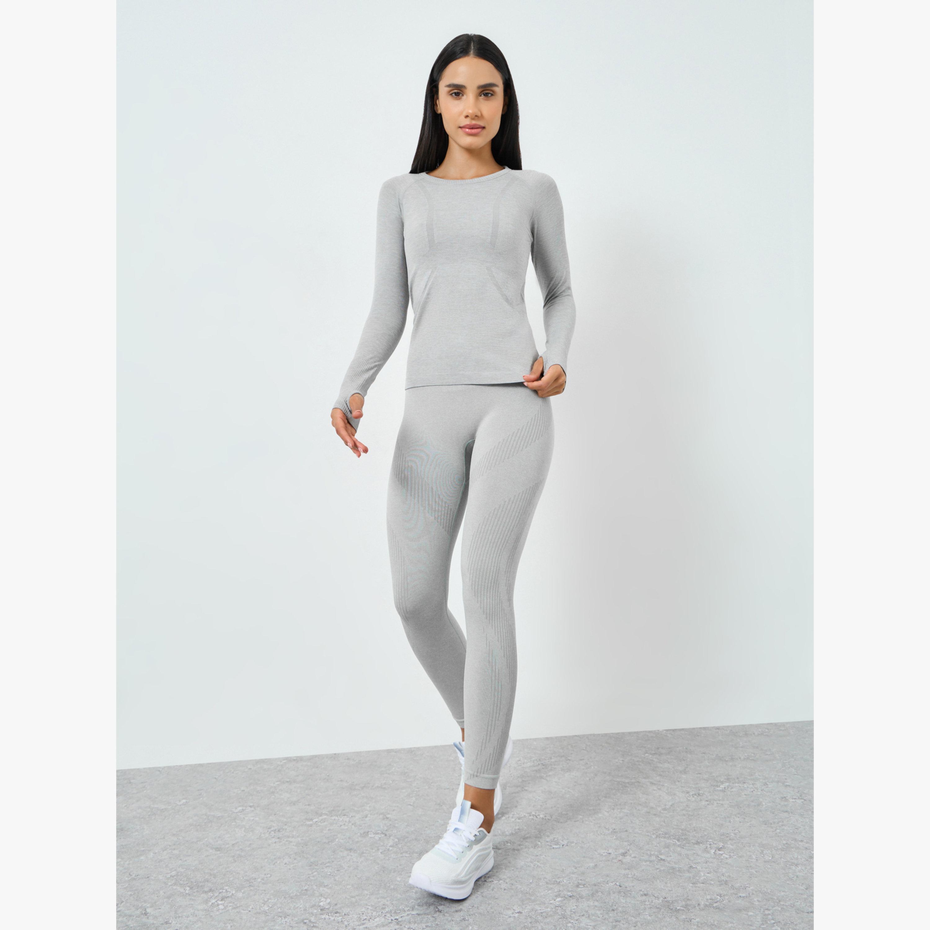 بلوزة بأكمام قصيرة وتفاصيل محددة-sports-women-clothing-tshirtsandvests-image-2