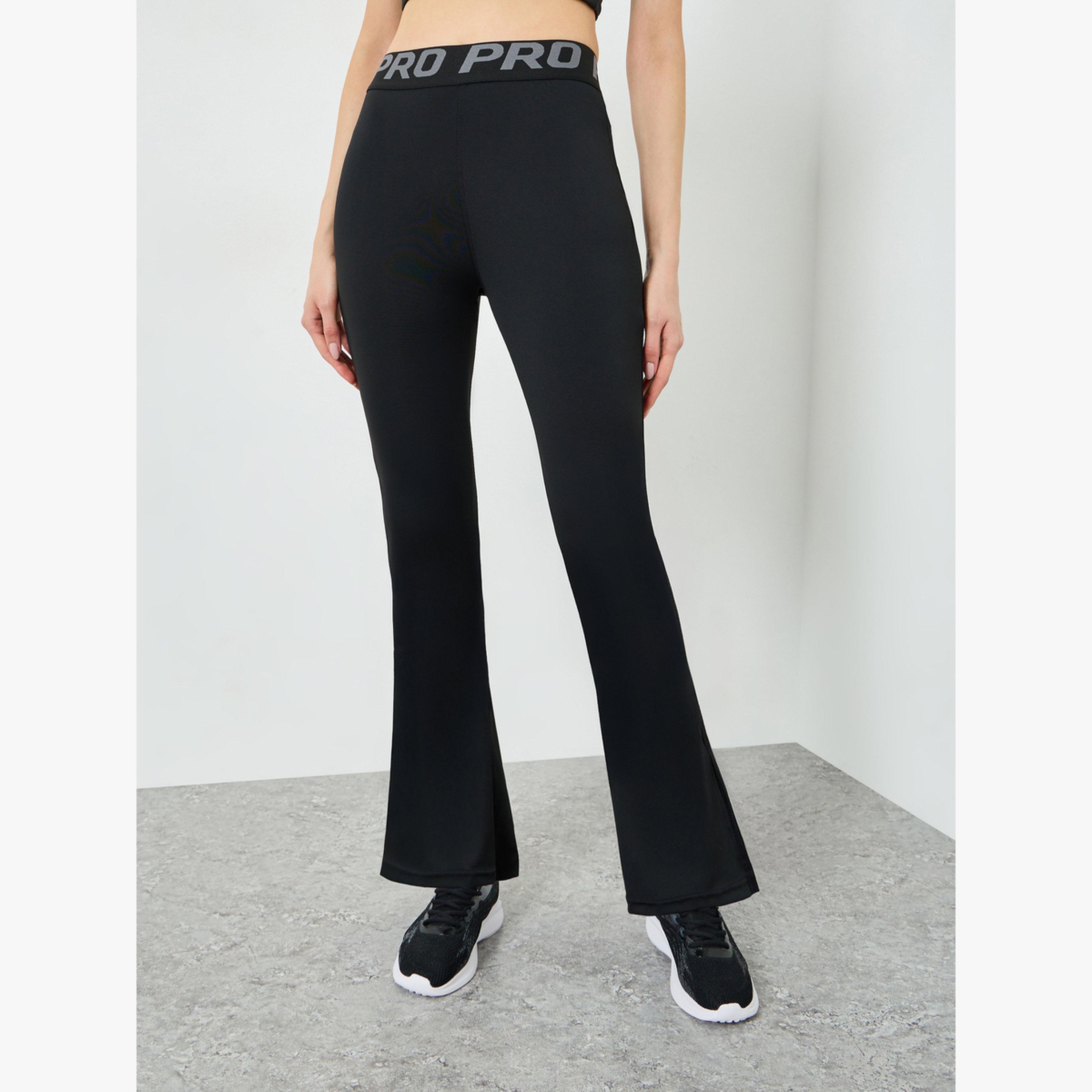 ليقنز واسع من الأسفل بفتحة جانبية وشريط نصي عند الخصر-sports-women-clothing-joggersandtrackpants-image-1