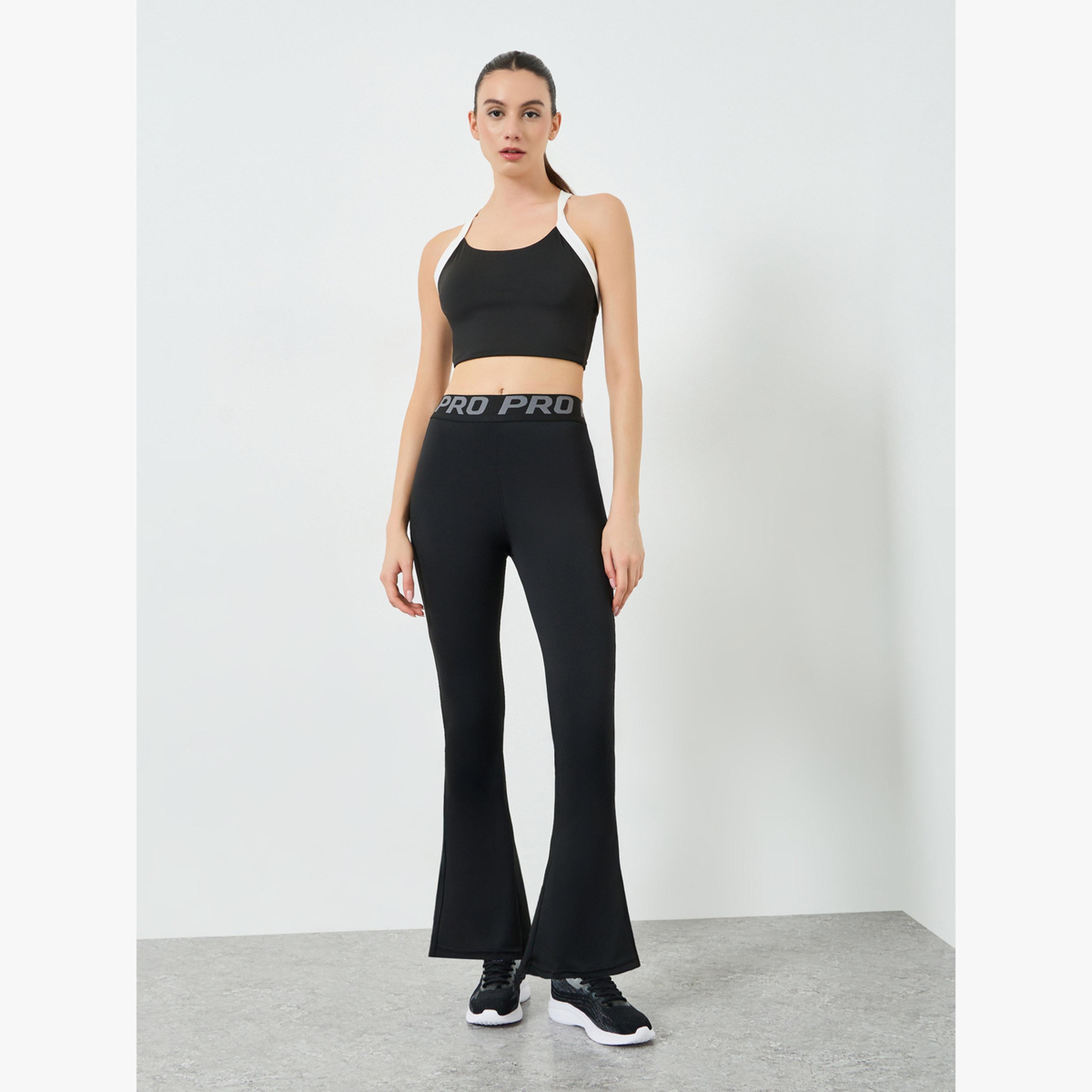 ليقنز واسع من الأسفل بفتحة جانبية وشريط نصي عند الخصر-sports-women-clothing-joggersandtrackpants-image-2