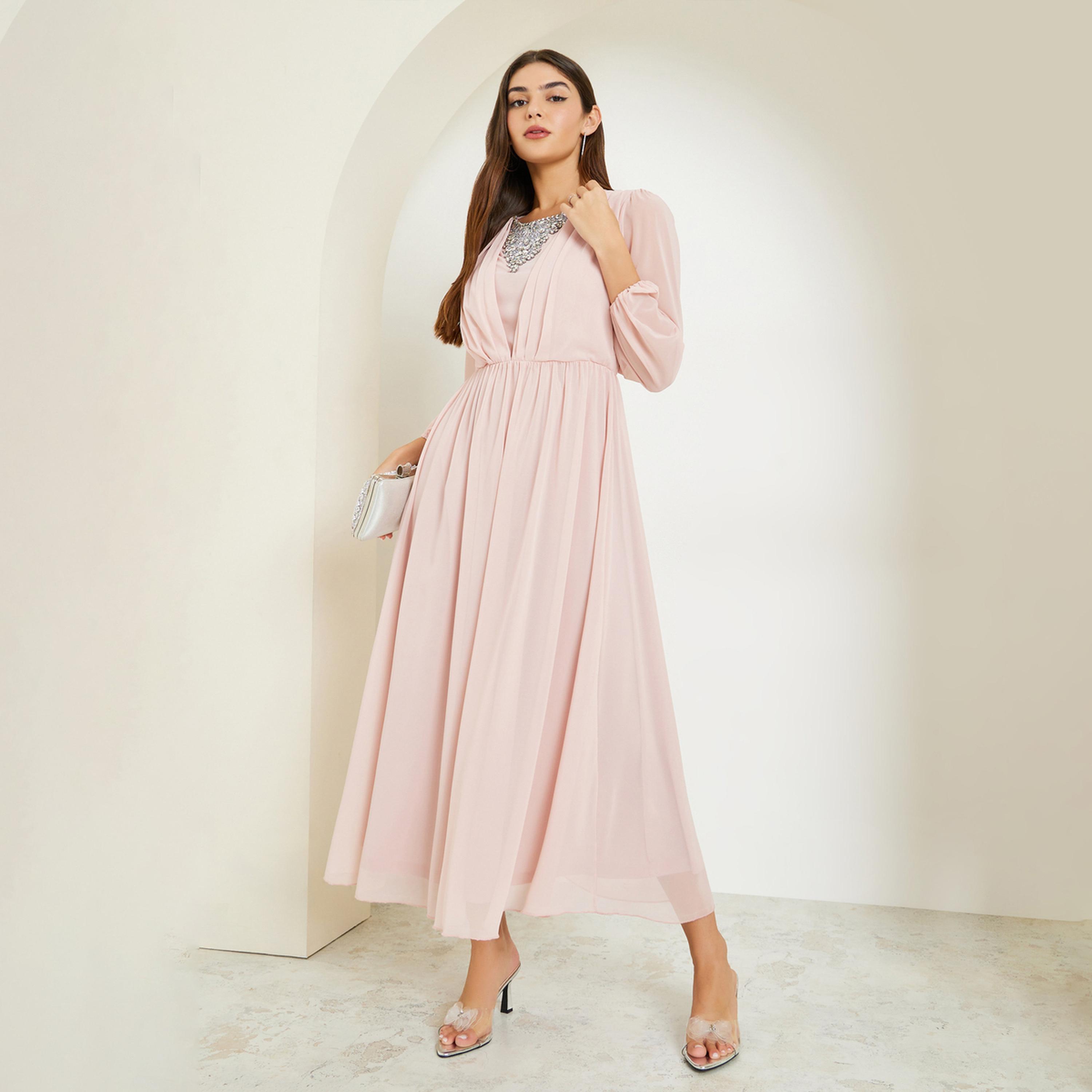 فستان طويل بحافة واسعة وأكمام منفوخة وتفاصيل مزينة-women-clothing-dresses-image-1