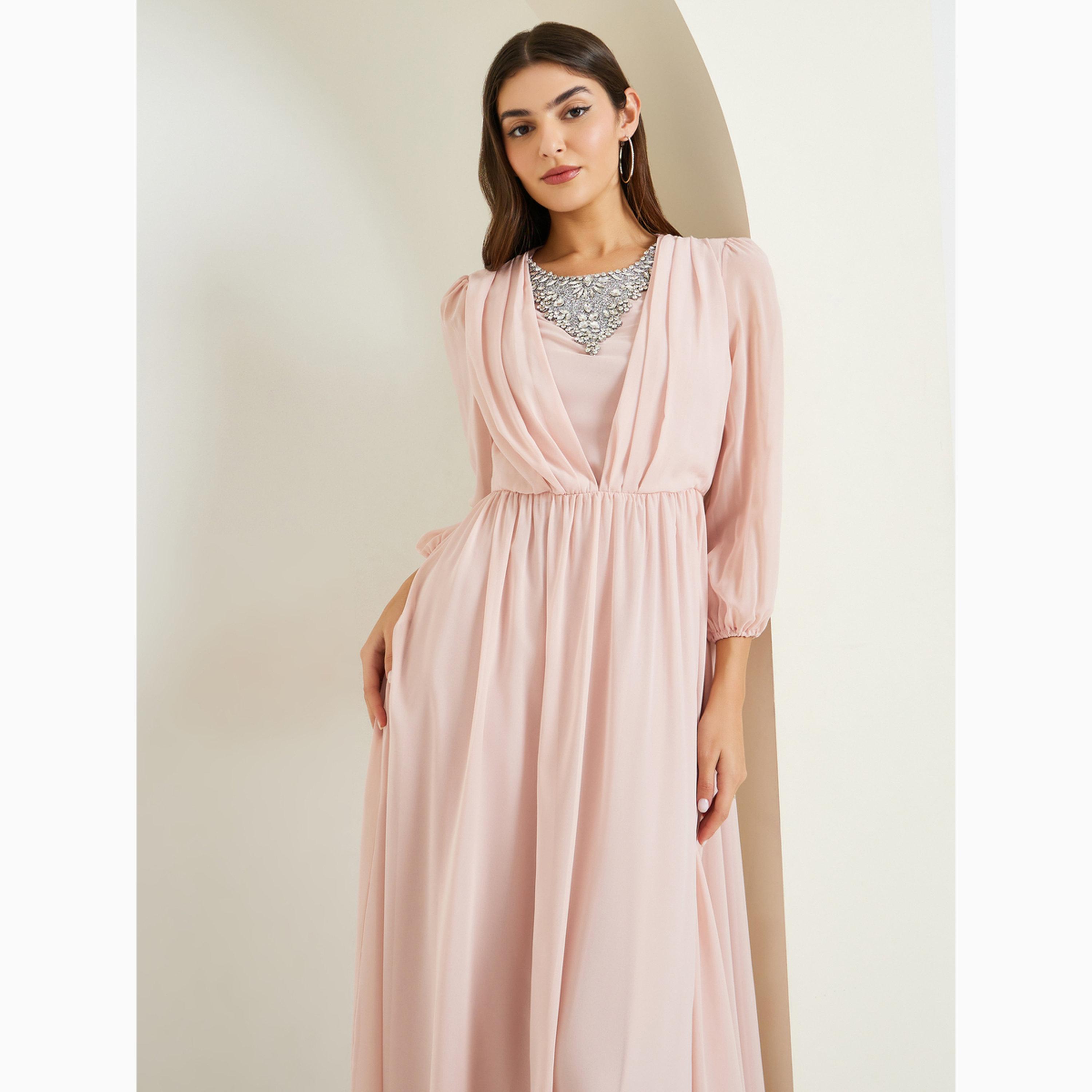 فستان طويل بحافة واسعة وأكمام منفوخة وتفاصيل مزينة-women-clothing-dresses-image-2