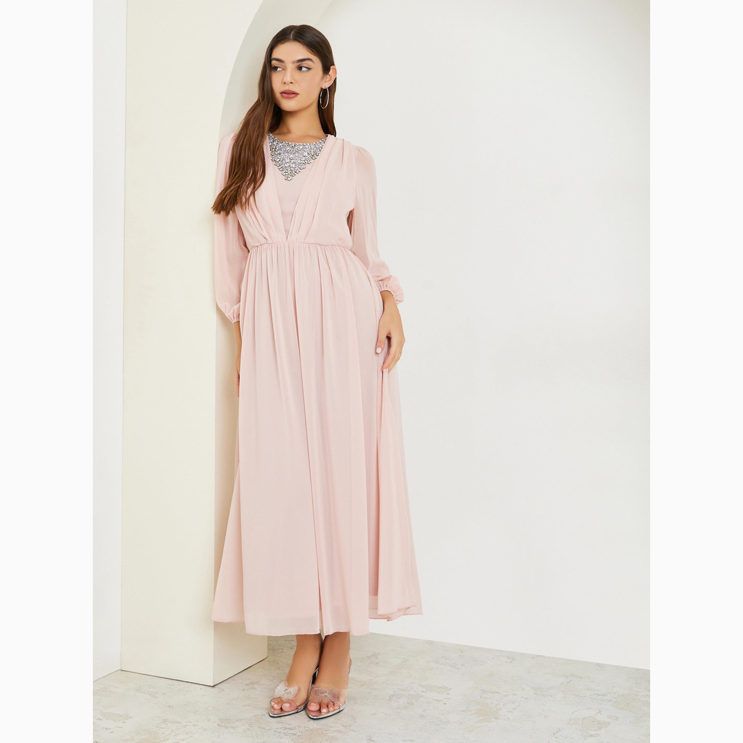 فستان طويل بحافة واسعة وأكمام منفوخة وتفاصيل مزينة-women-clothing-dresses-image-3