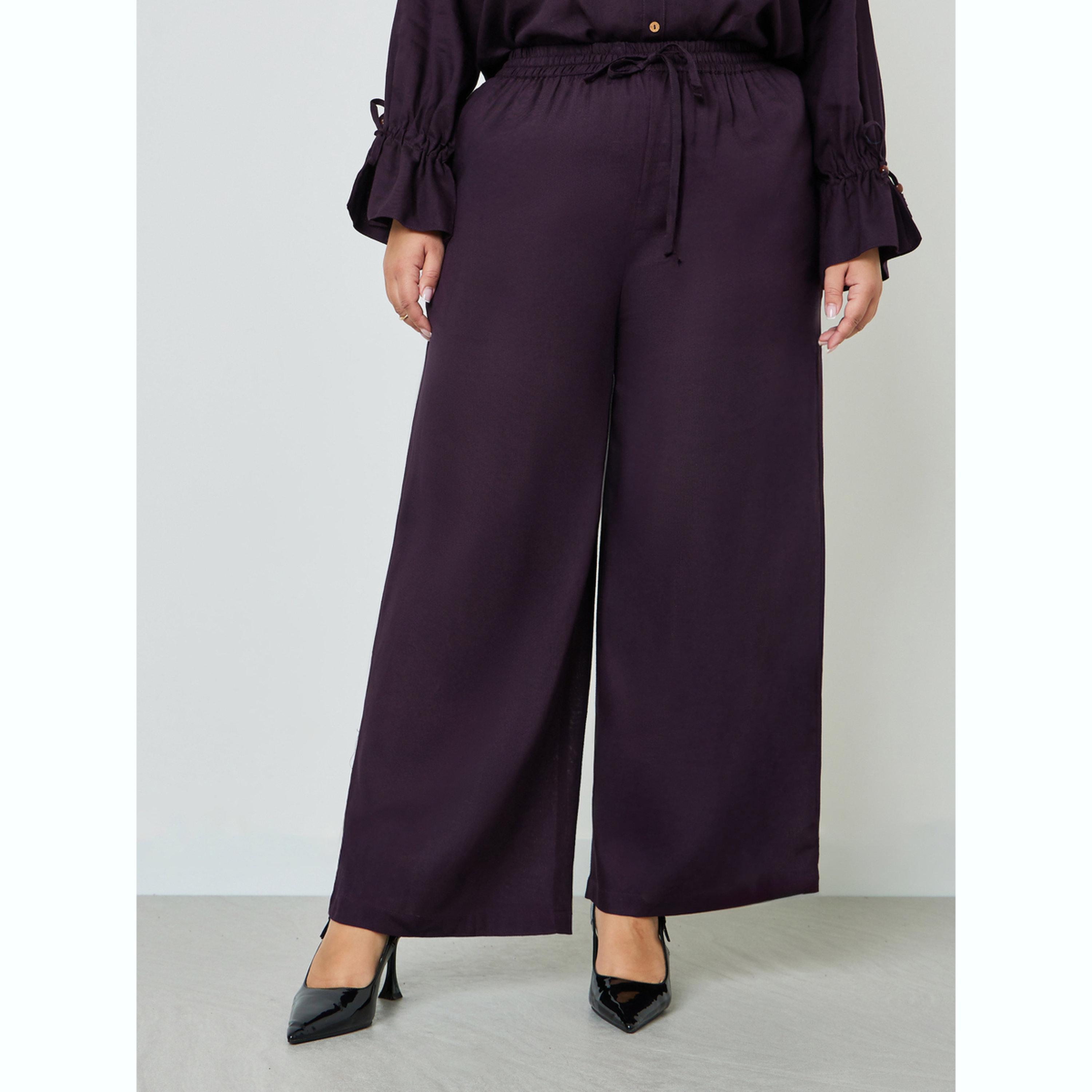 بنطال قطني بلون سادة وأرجل واسعة بمقاس كبير-women-clothing-plussize-joggers-image-1