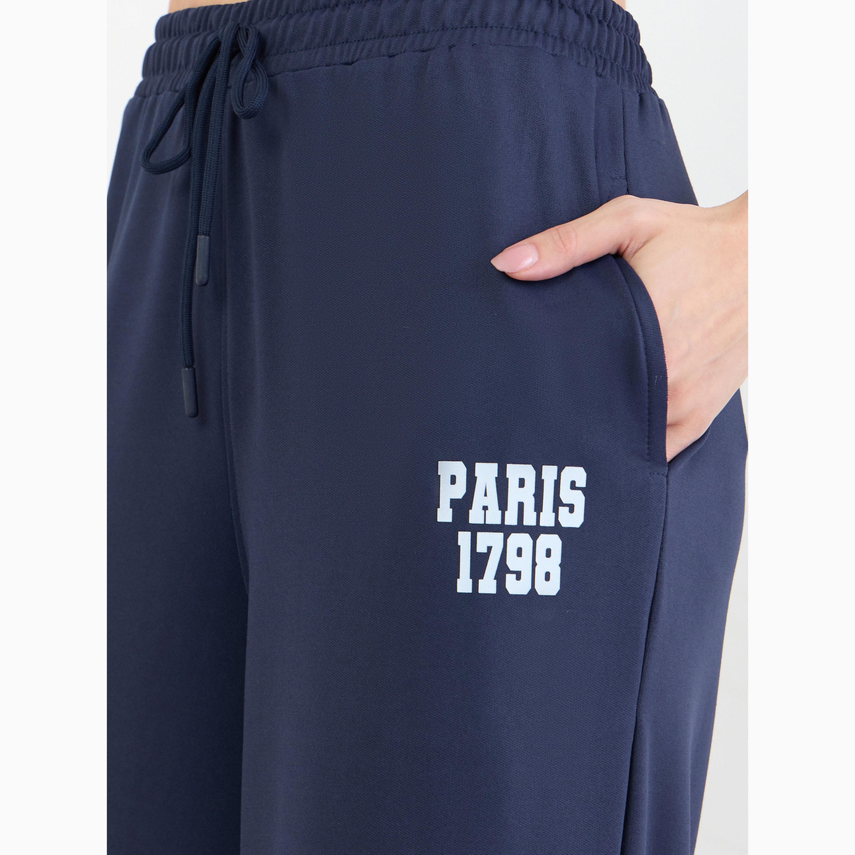 جوغر بأرجل واسعة وطبعة نصية-women-clothing-bottoms-joggers-image-3