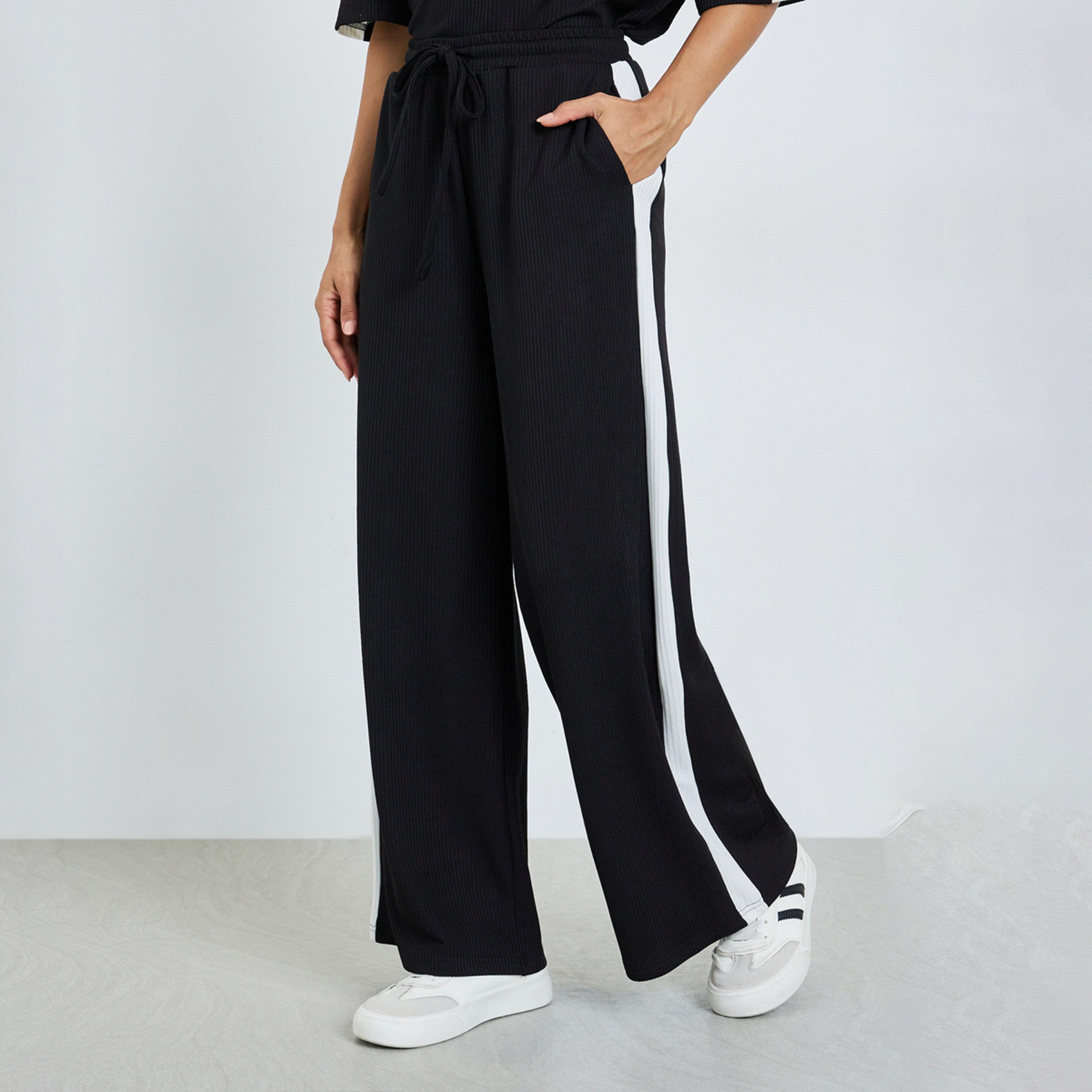 Styli Black Wide Leg Joggers with Side Stripe-women-clothing-bottoms-joggers-image-1