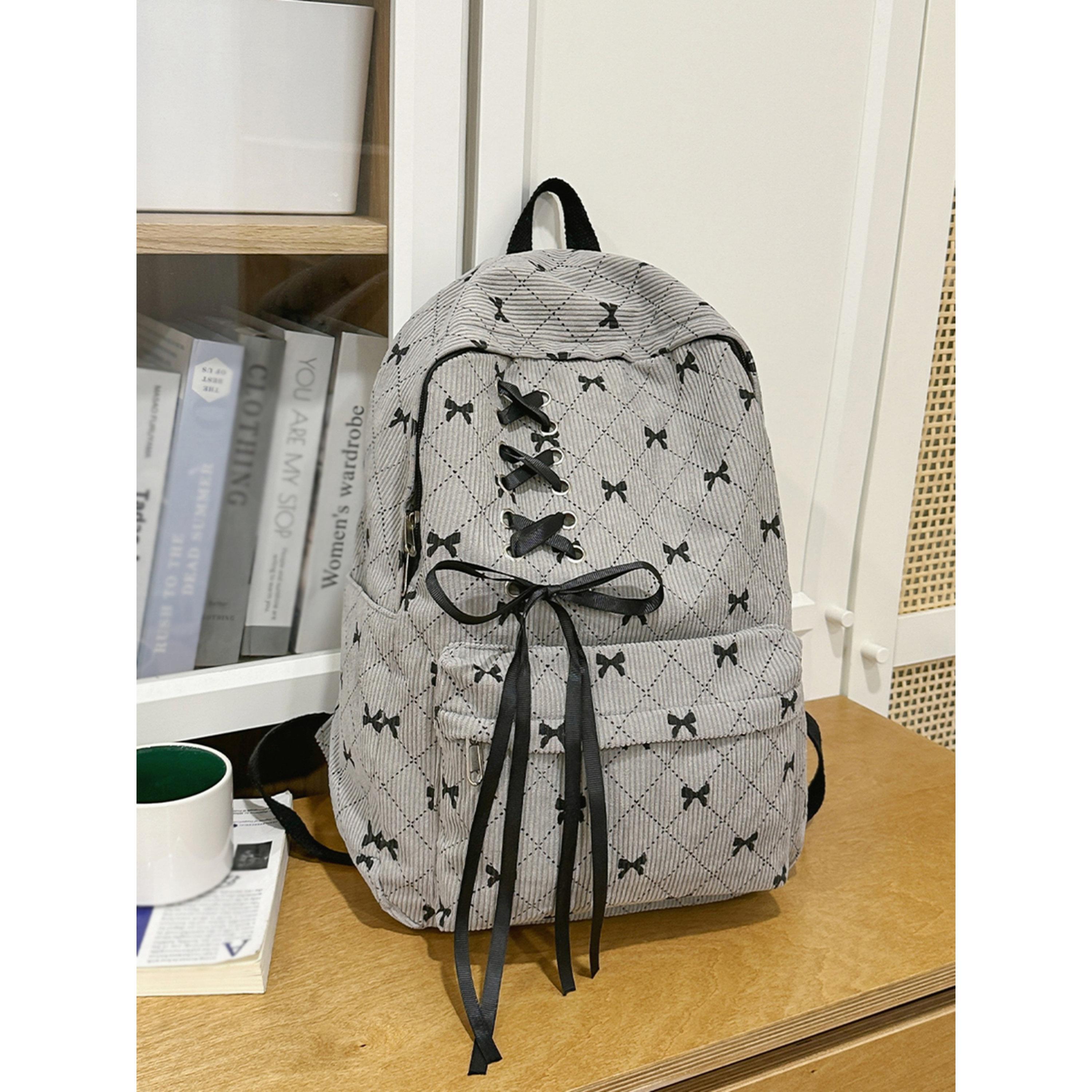شنطة ظهر بتفاصيل عقدة-women-bagsandwallets-backpacks-image-1