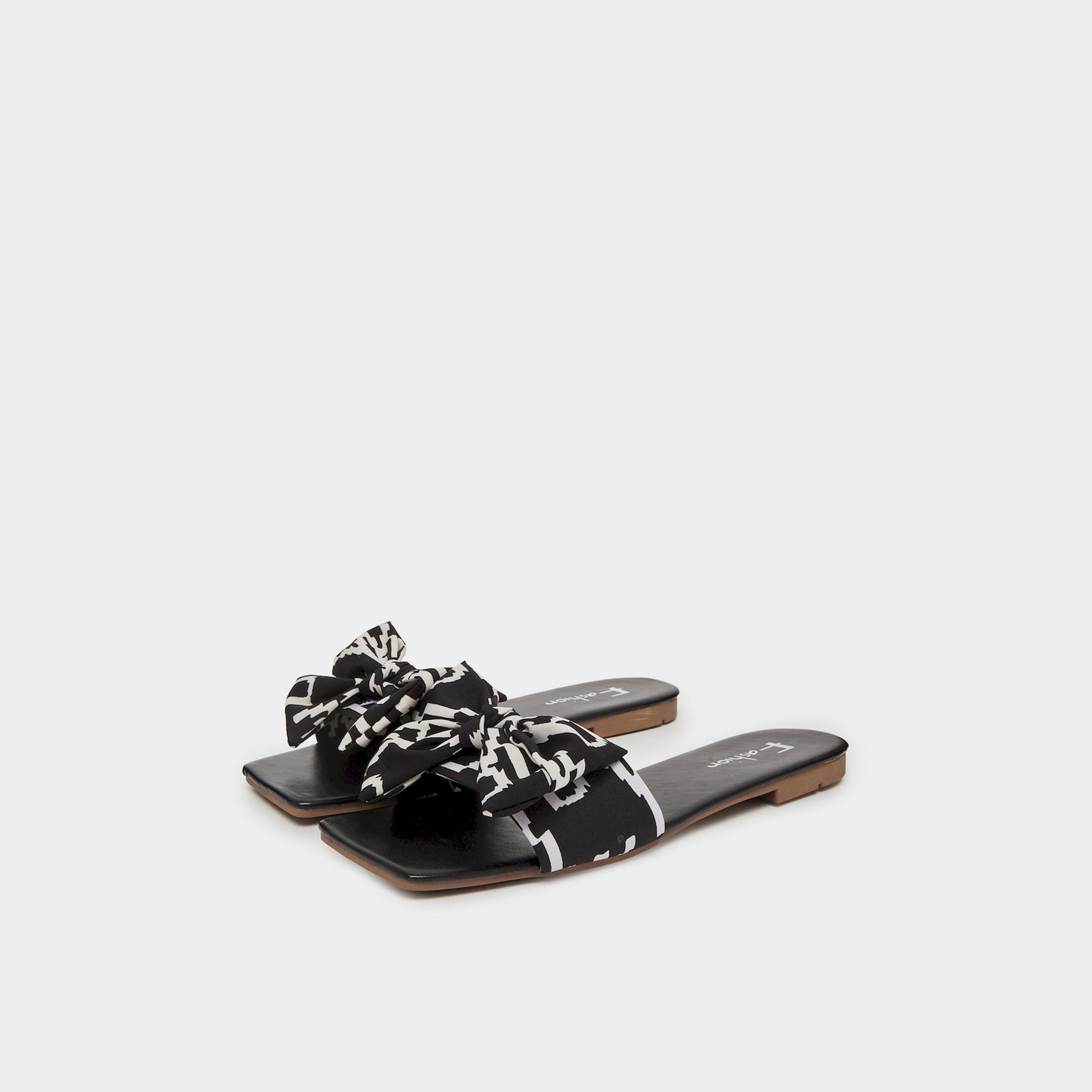 تيك تو × ستايلي - شبشب مسطح سهل الارتداء بفيونكة لون اسود-women-shoes-sandals-flats-image-1