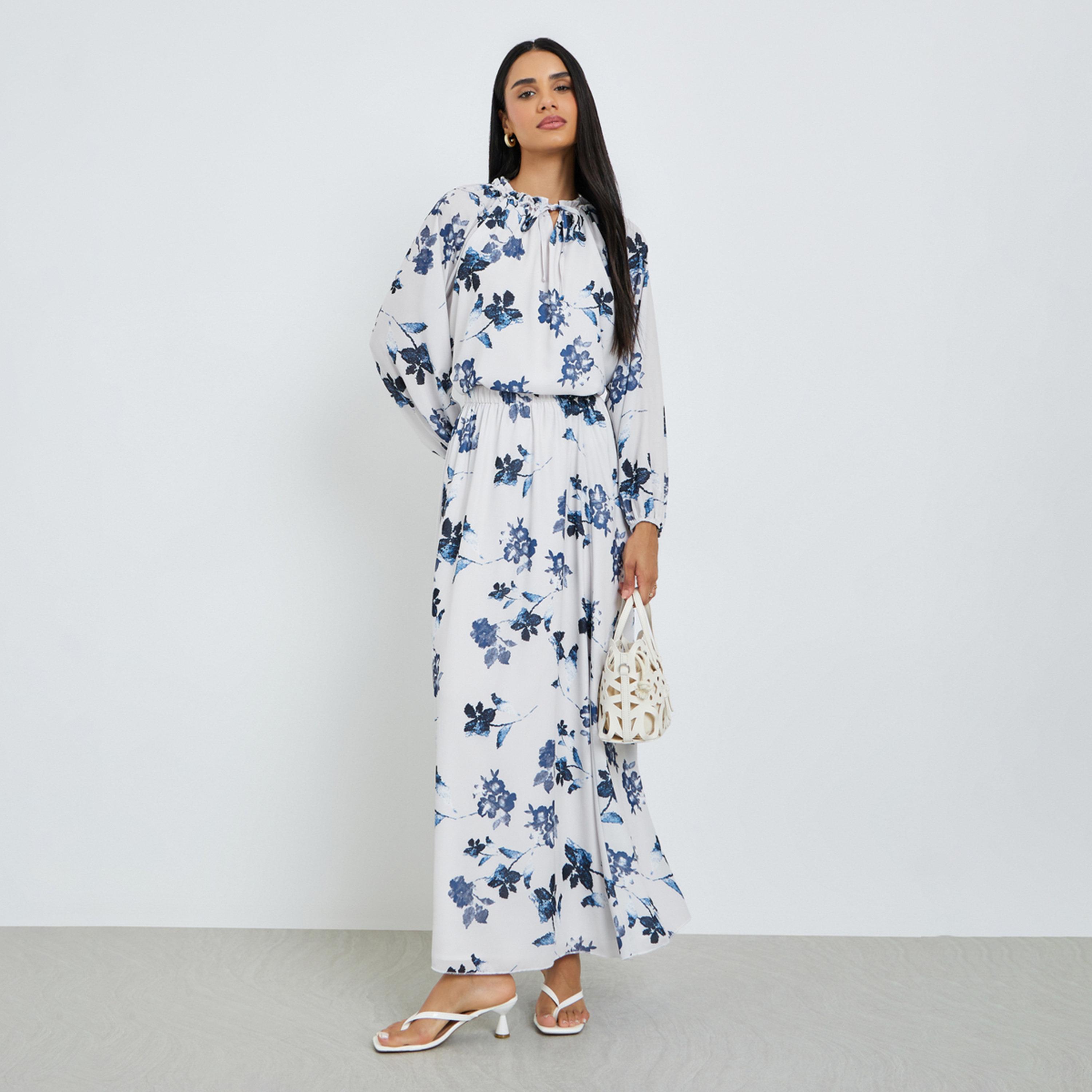 طقم منسق من تنورة طويلة وبلوزة بطبعة زهور-women-clothing-coordsets-image-1