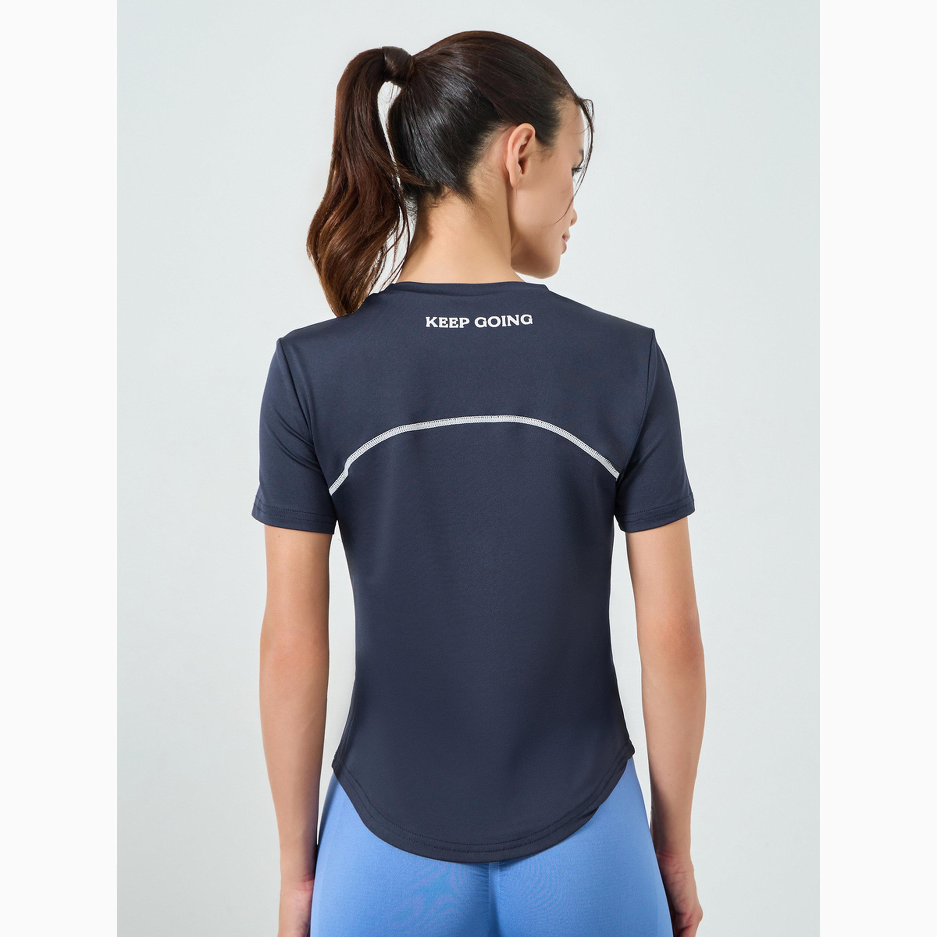 بلوزة بياقة عالية وأكمام قصيرة وتفاصيل درزات مباينة لون كحلي-sports-women-clothing-tshirtsandvests-image-5