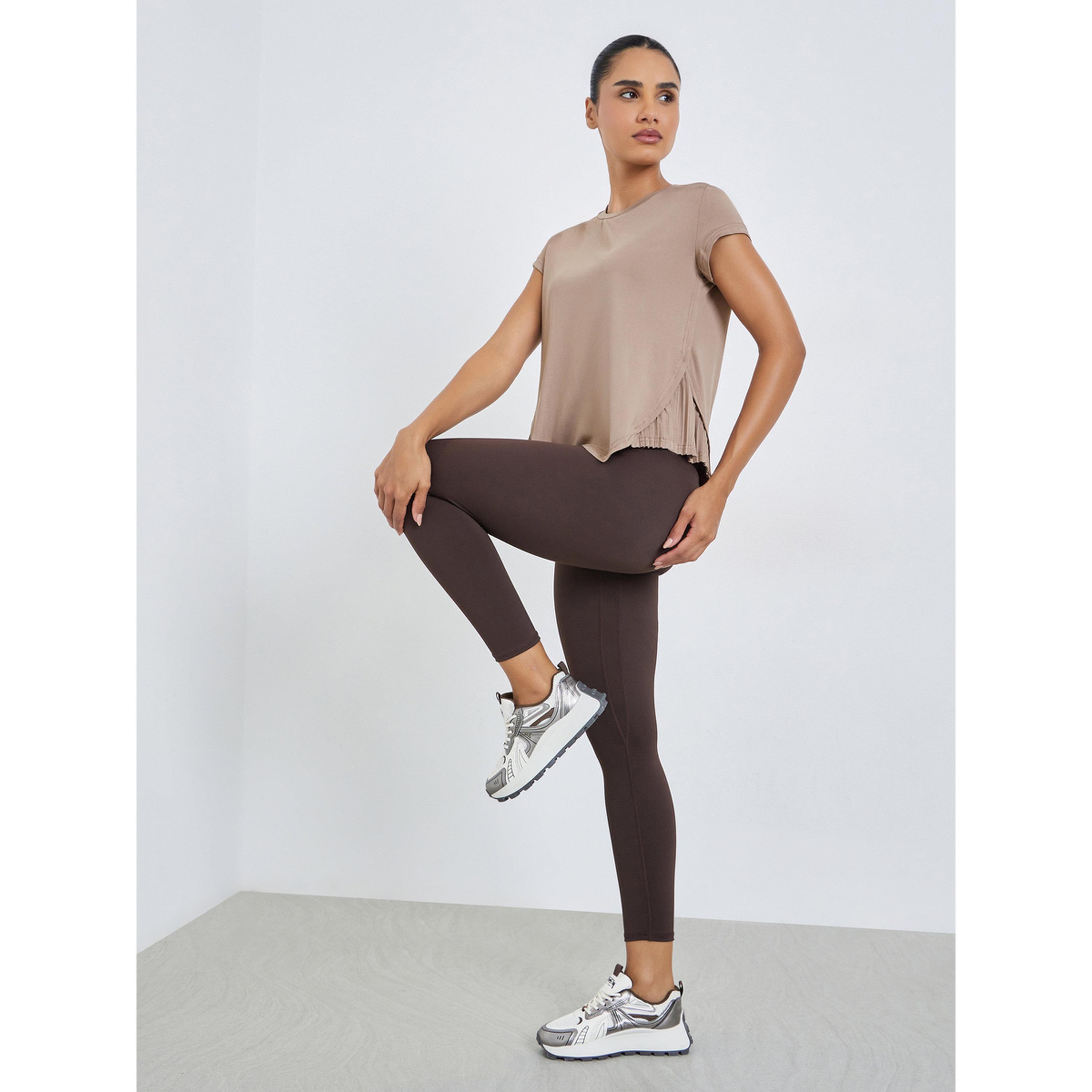 بلوزة بأكمام قصيرة وحافة بكسرات-sports-women-clothing-tshirtsandvests-image-2
