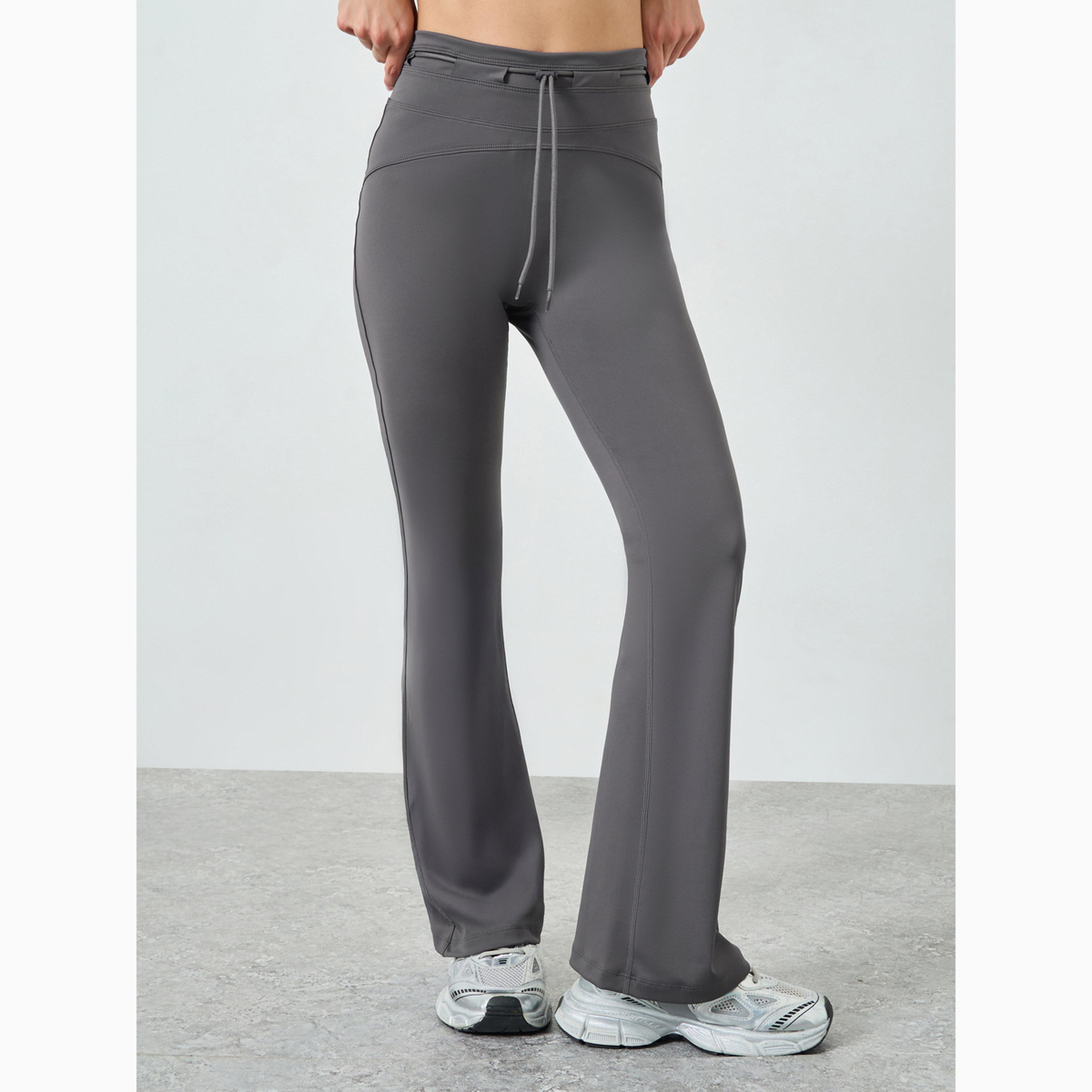 بنطال واسع وتفاصيل تاش من عند الخصر لون شاركول-women-clothing-sportswearandactivewear-bottoms-joggersandtrackpants-image-1