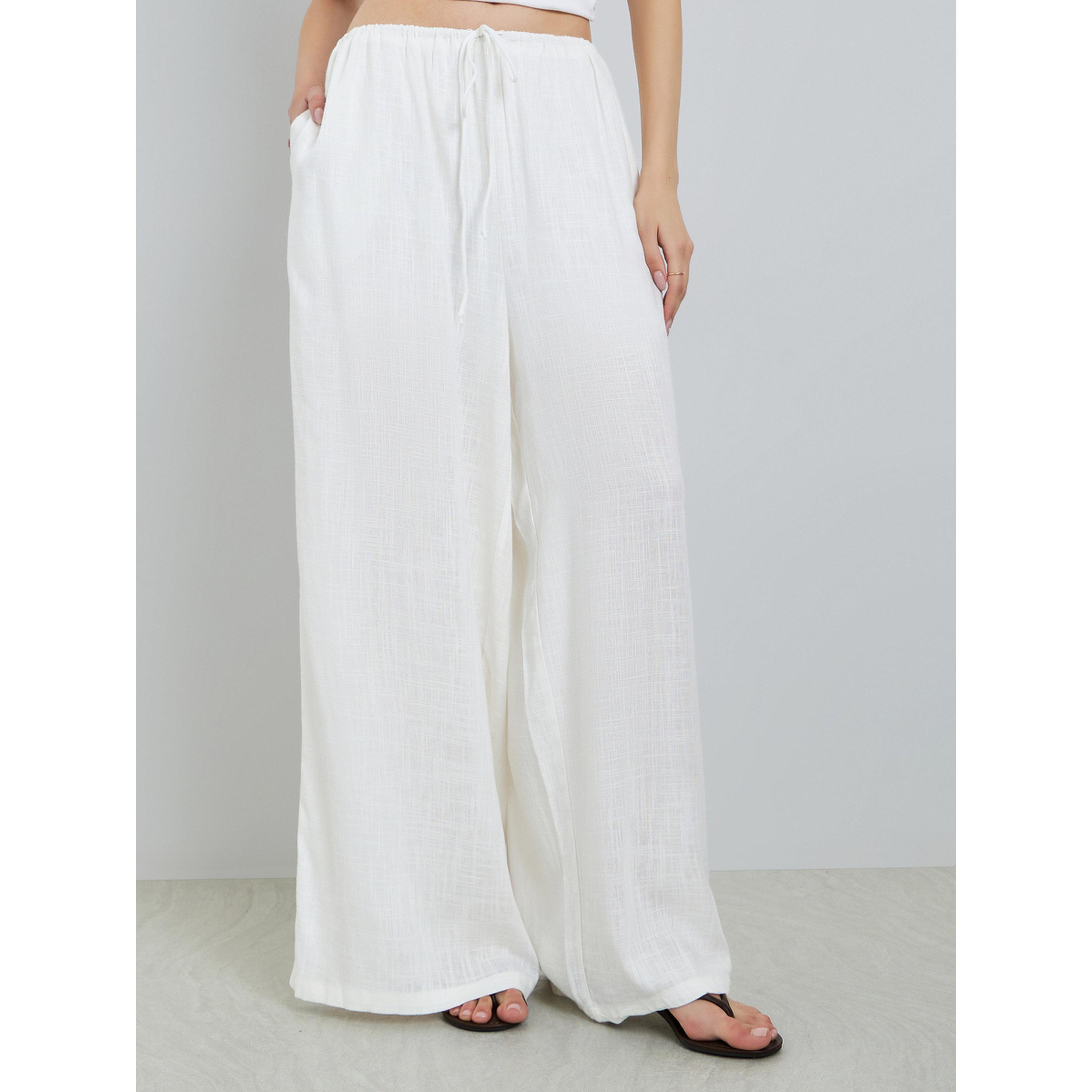 تيك تو × ستايلي - بنطال أبيض واسع الساقين بقصة مريحة-women-clothing-bottoms-joggers-image-1