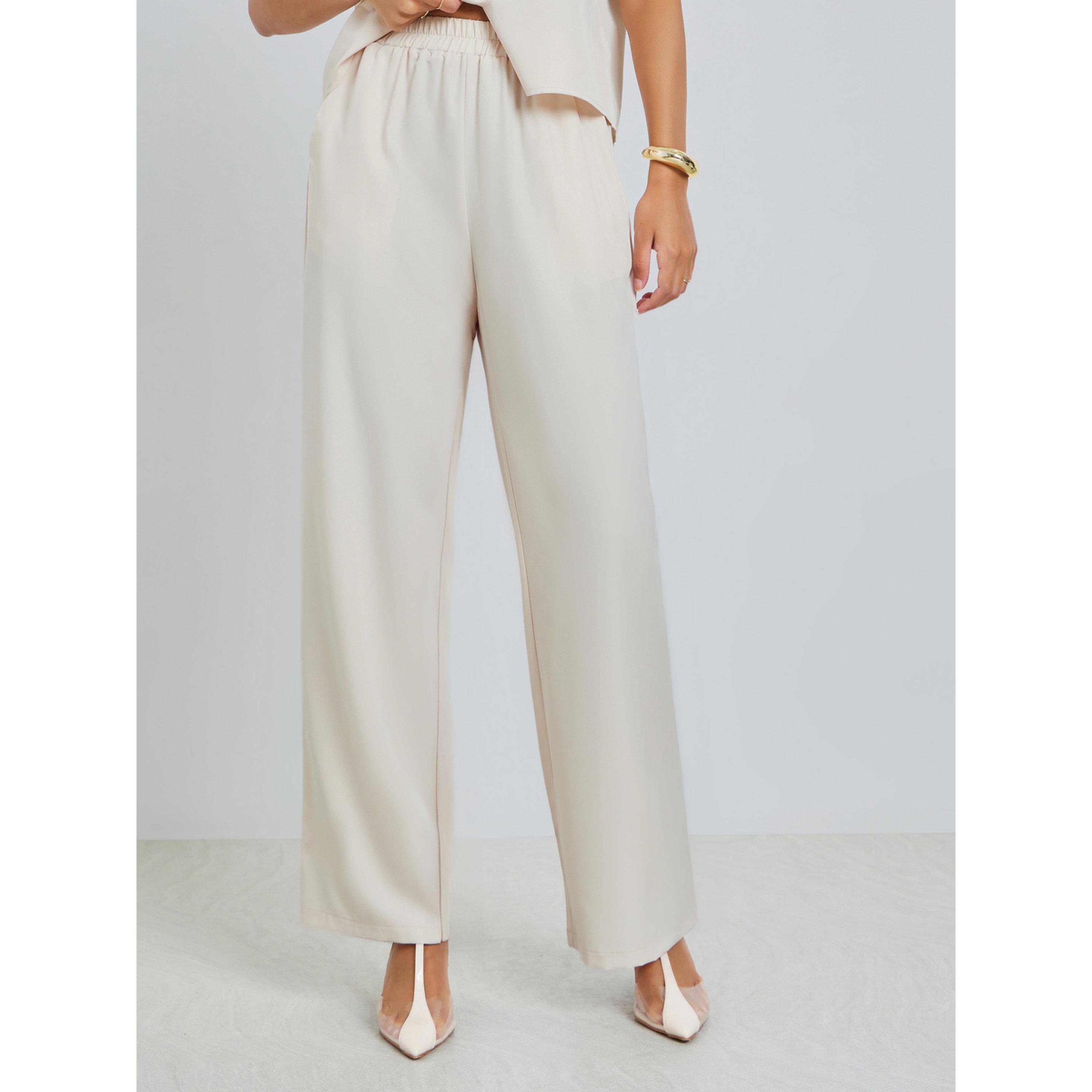 مجموعة من بنطال بأرجل واسعة وبلوزة بأكمام قصيرة-women-clothing-coordsets-image-5