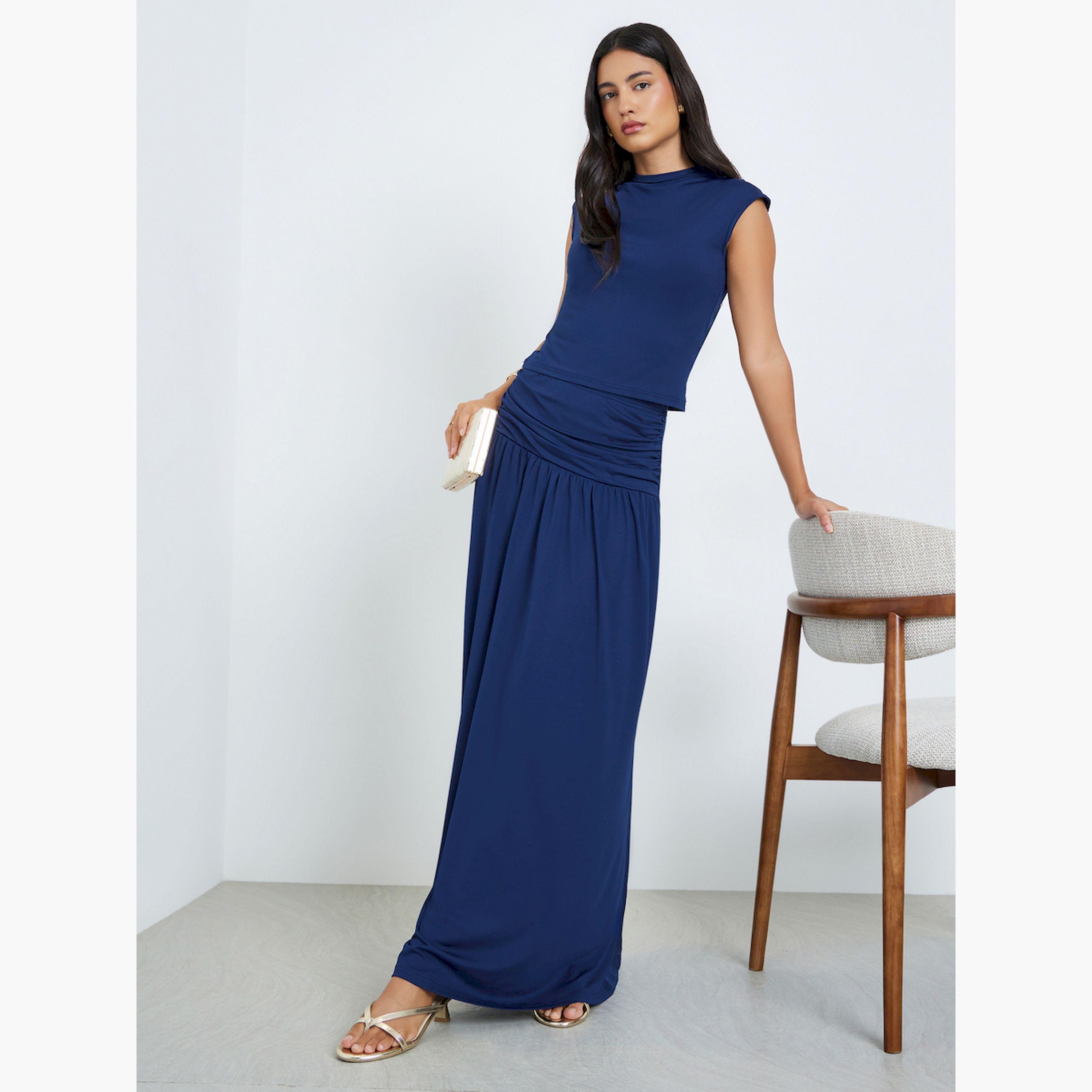 ستايلي - طقم بلوزة بدون أكمام وتنورة طويلة من الصوف المحبوك لون كحلي-women-clothing-coordsets-image-1