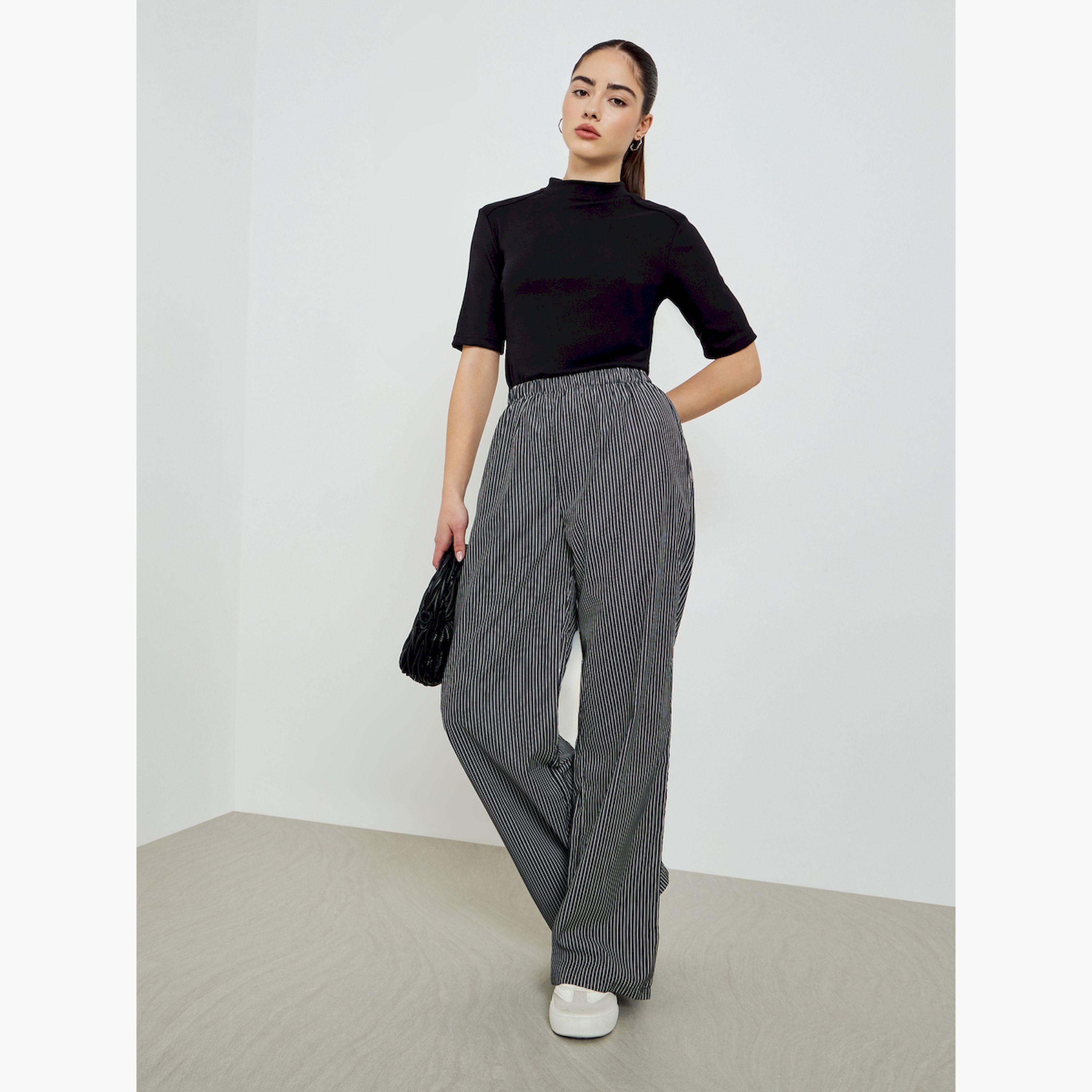 بنطال مخطط بخصر مطاطي وأرجل واسعة-women-clothing-bottoms-trousers-image-2